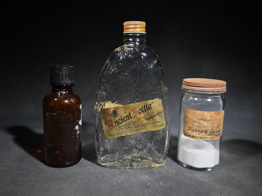 Trio of Vintage Glass Bottles and Jars including "Ancient Bottle" Whiskey by Distillers Corporation Limited of Canada and Powdered French Chalk Jar from Harry C. Zeisig Drugstore