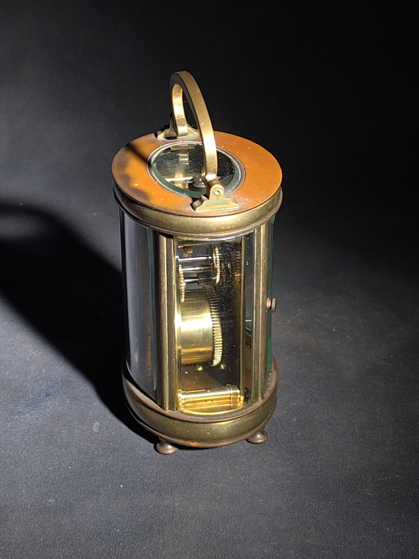 Antique French Brass Oval Carriage Clock with Five Beveled Glass Panels and Roman Numeral Dial, France, Chipped