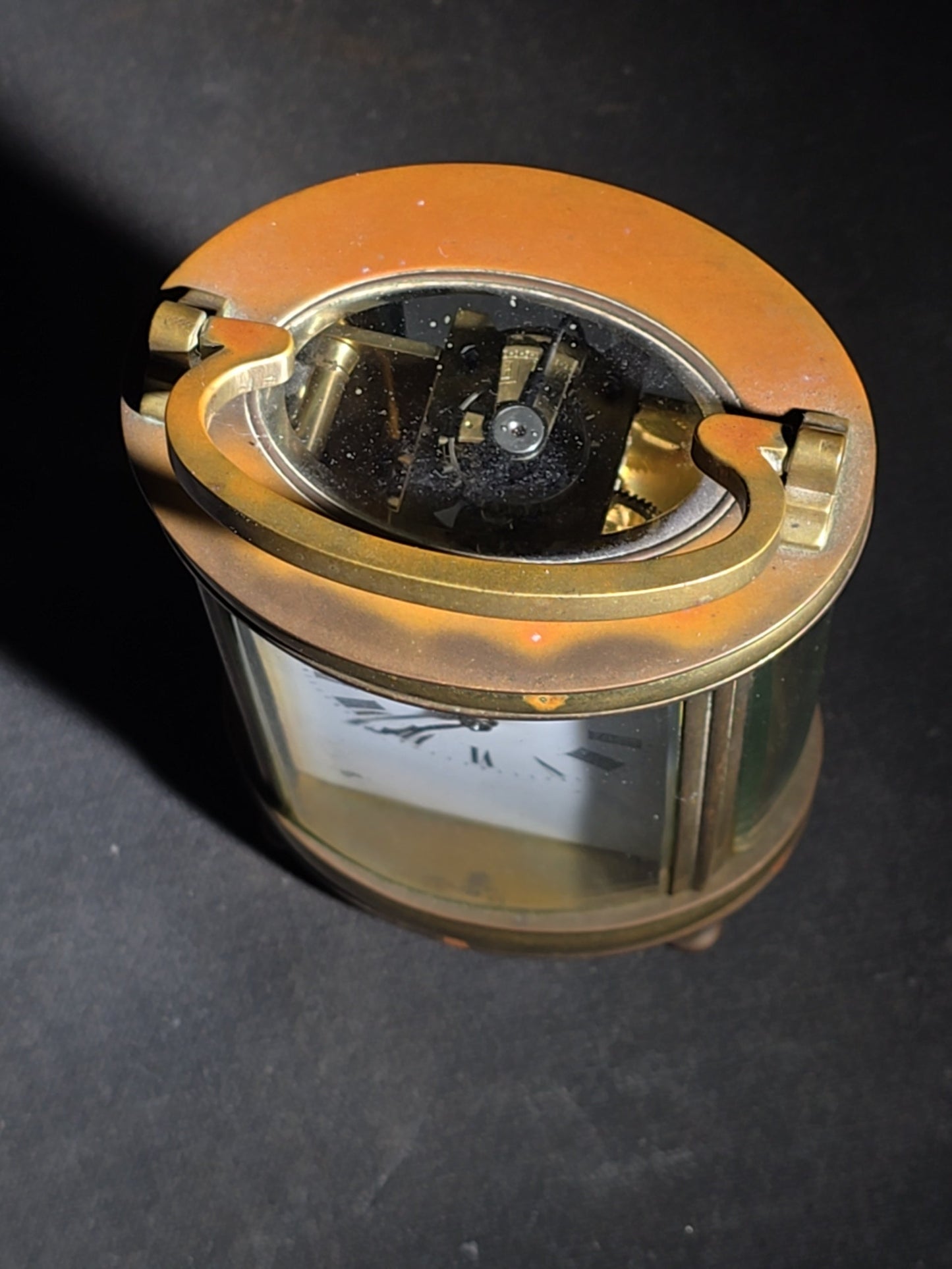 Antique French Brass Oval Carriage Clock with Five Beveled Glass Panels and Roman Numeral Dial, France, Chipped