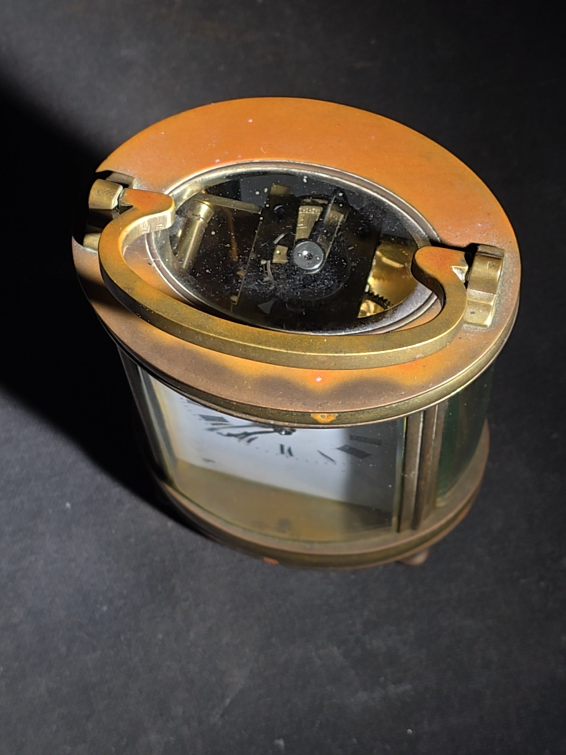Antique French Brass Oval Carriage Clock with Five Beveled Glass Panels and Roman Numeral Dial, France, Chipped