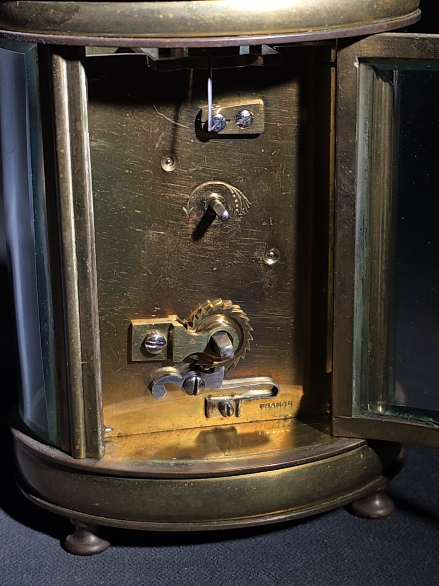Antique French Brass Oval Carriage Clock with Five Beveled Glass Panels and Roman Numeral Dial, France, Chipped