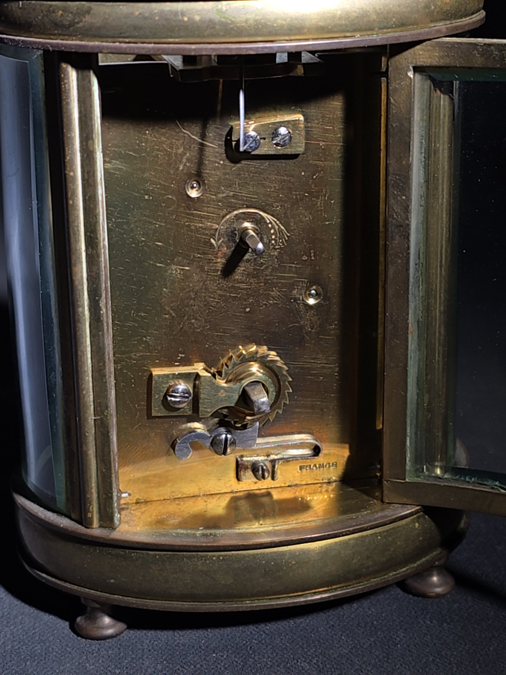 Antique French Brass Oval Carriage Clock with Five Beveled Glass Panels and Roman Numeral Dial, France, Chipped