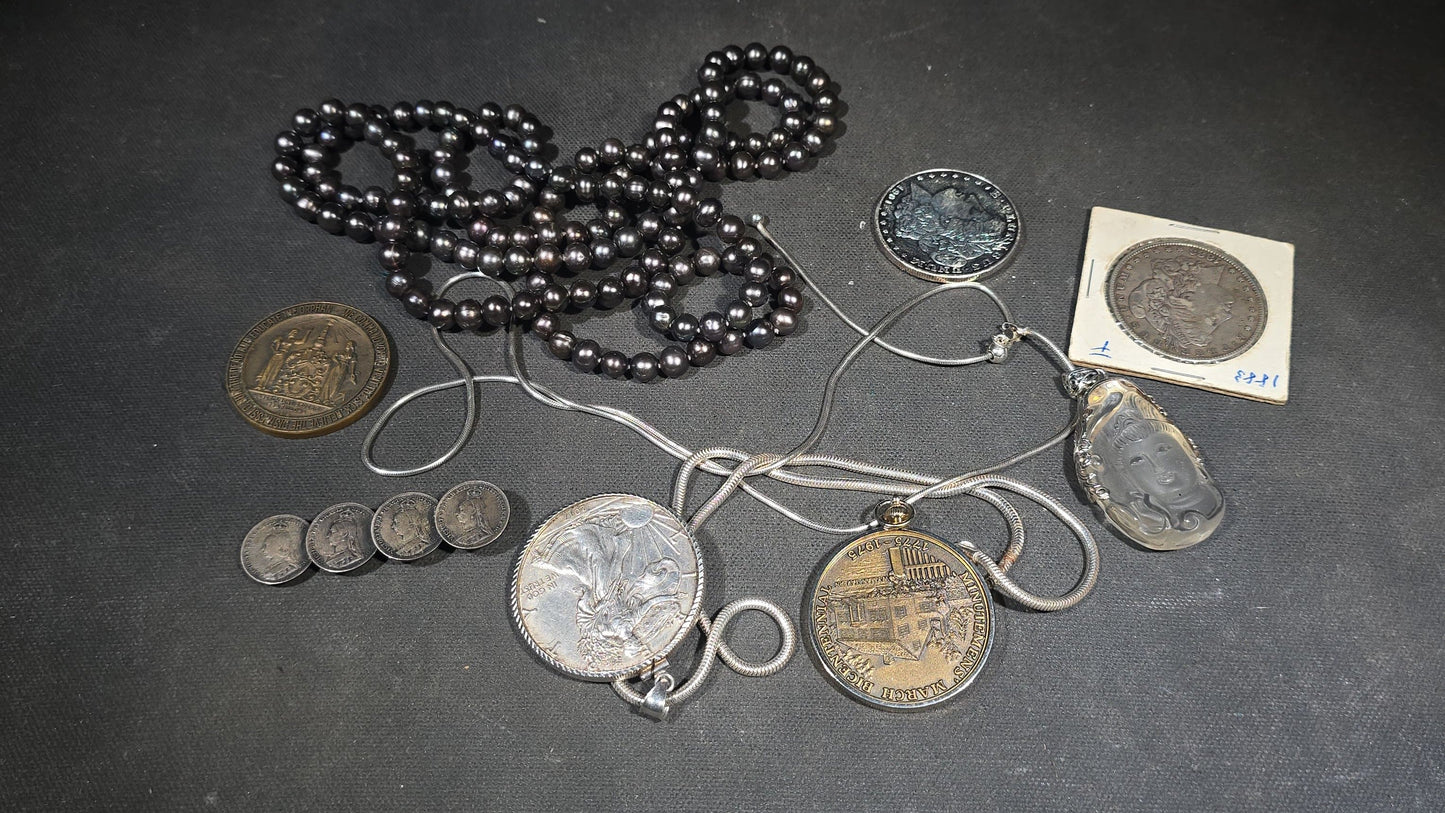 Grouping of Antique and Reproduction Coins, Coin Pendants, Bead Necklaces, and Carved Pendant including 1883 Morgan Dollar and Seated Liberty Coin Jewelry