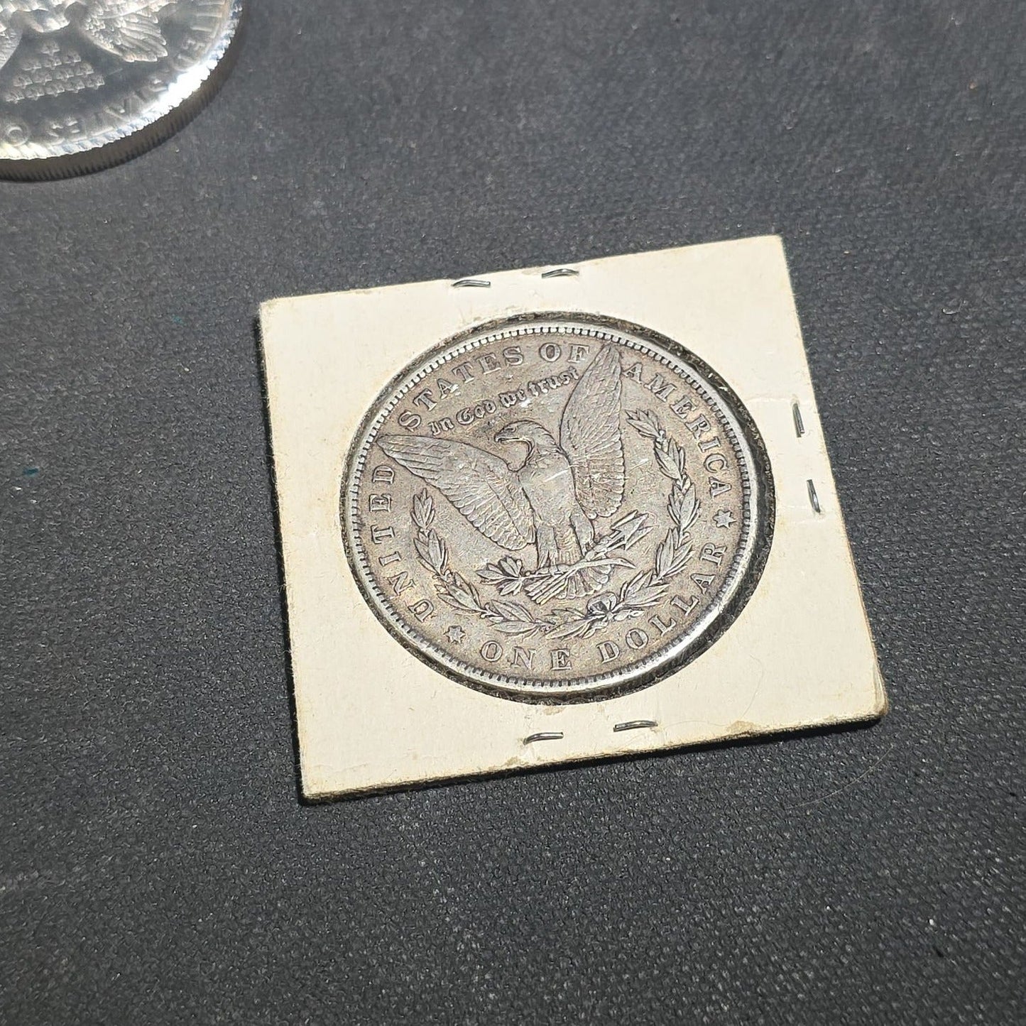 Grouping of Antique and Reproduction Coins, Coin Pendants, Bead Necklaces, and Carved Pendant including 1883 Morgan Dollar and Seated Liberty Coin Jewelry