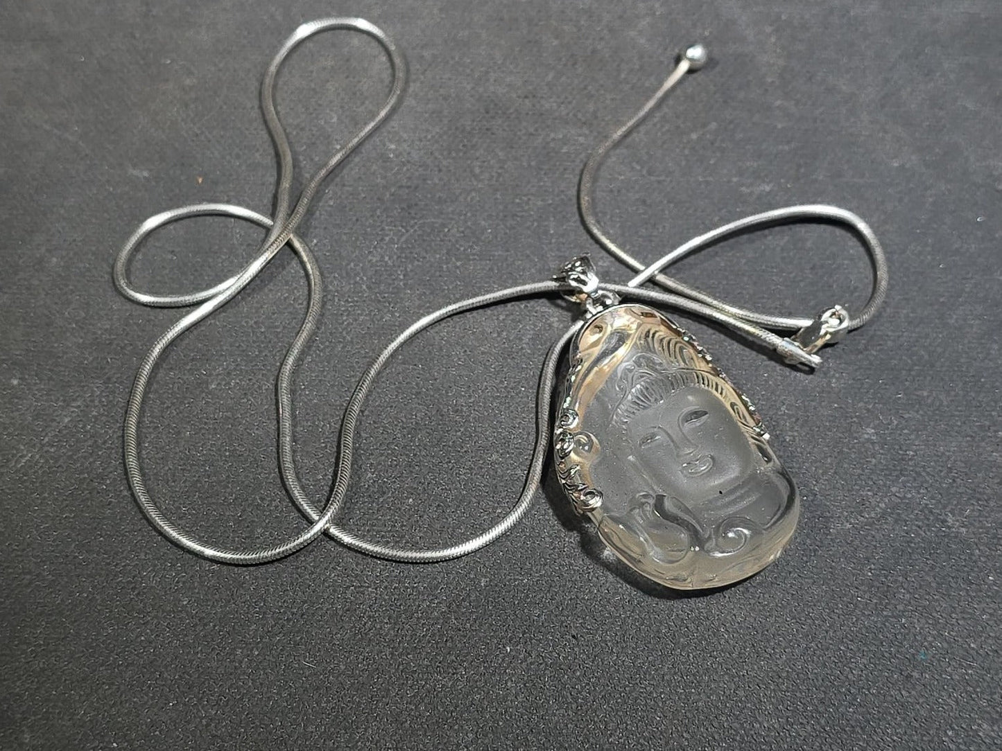 Grouping of Antique and Reproduction Coins, Coin Pendants, Bead Necklaces, and Carved Pendant including 1883 Morgan Dollar and Seated Liberty Coin Jewelry