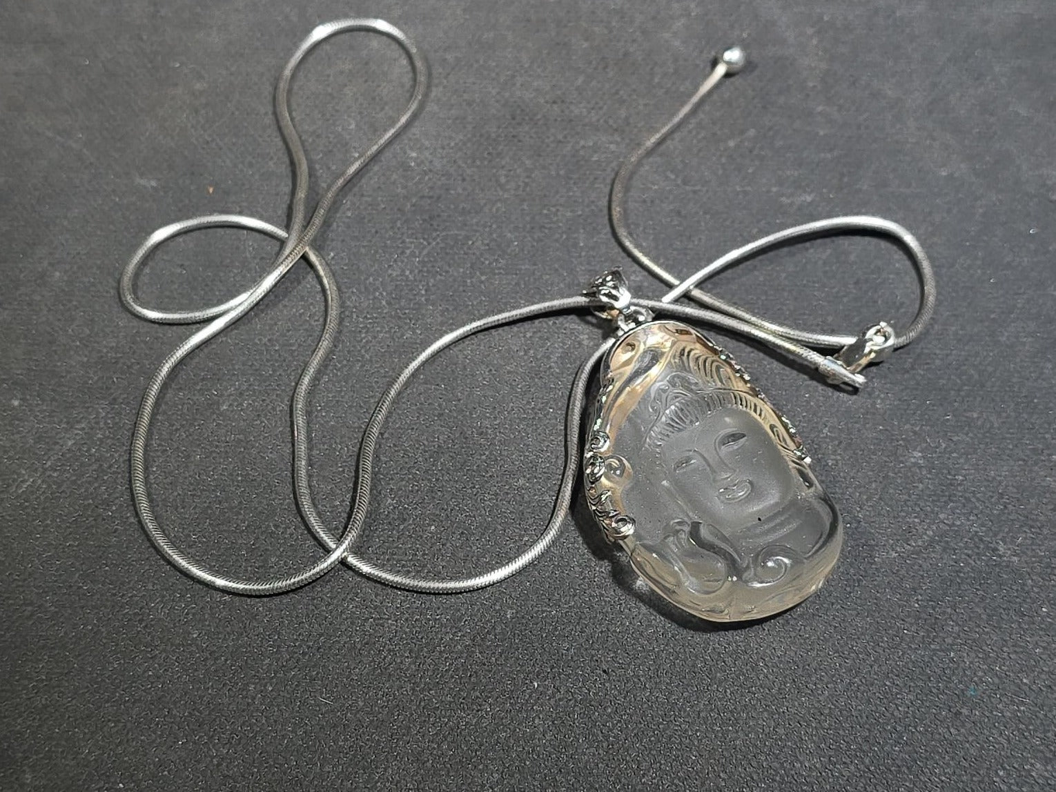 Grouping of Antique and Reproduction Coins, Coin Pendants, Bead Necklaces, and Carved Pendant including 1883 Morgan Dollar and Seated Liberty Coin Jewelry