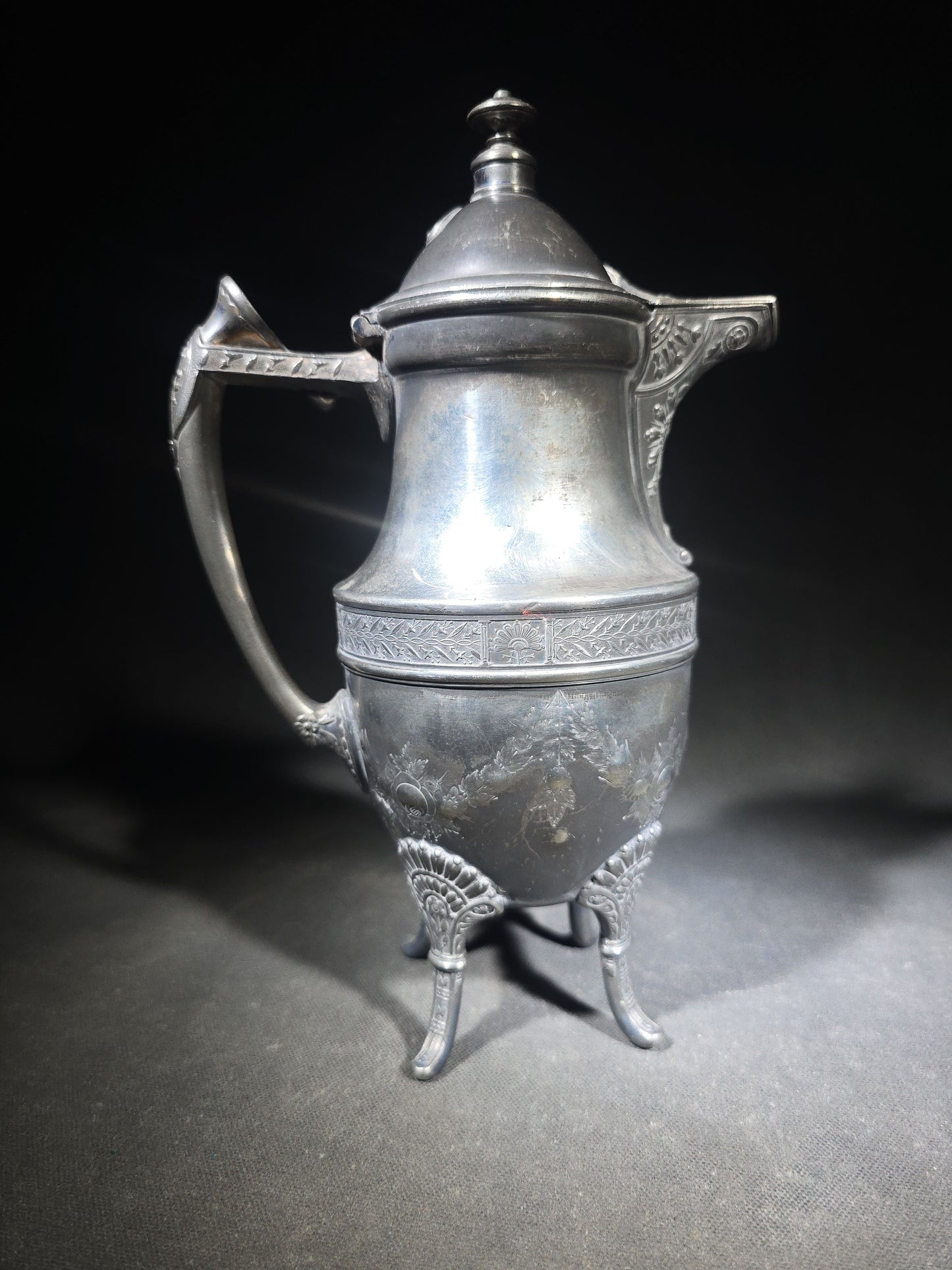 Pair of Antique Silverplate Serving Pieces including Reed & Barton Footed Coffeepot No. 2930 and Monogrammed Spherical Teapot with Lion Mask and Paw Feet