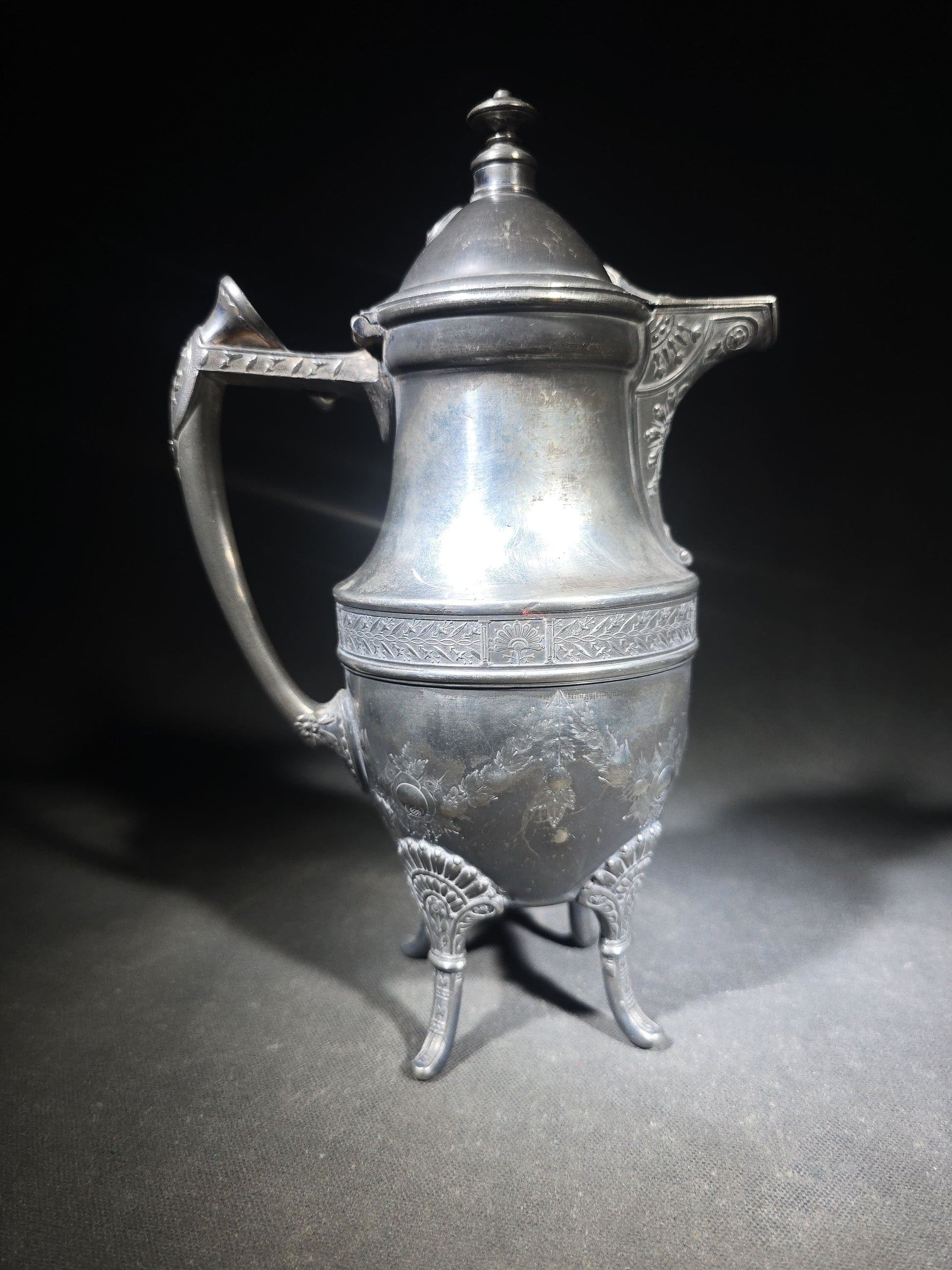 Pair of Antique Silverplate Serving Pieces including Reed & Barton Footed Coffeepot No. 2930 and Monogrammed Spherical Teapot with Lion Mask and Paw Feet