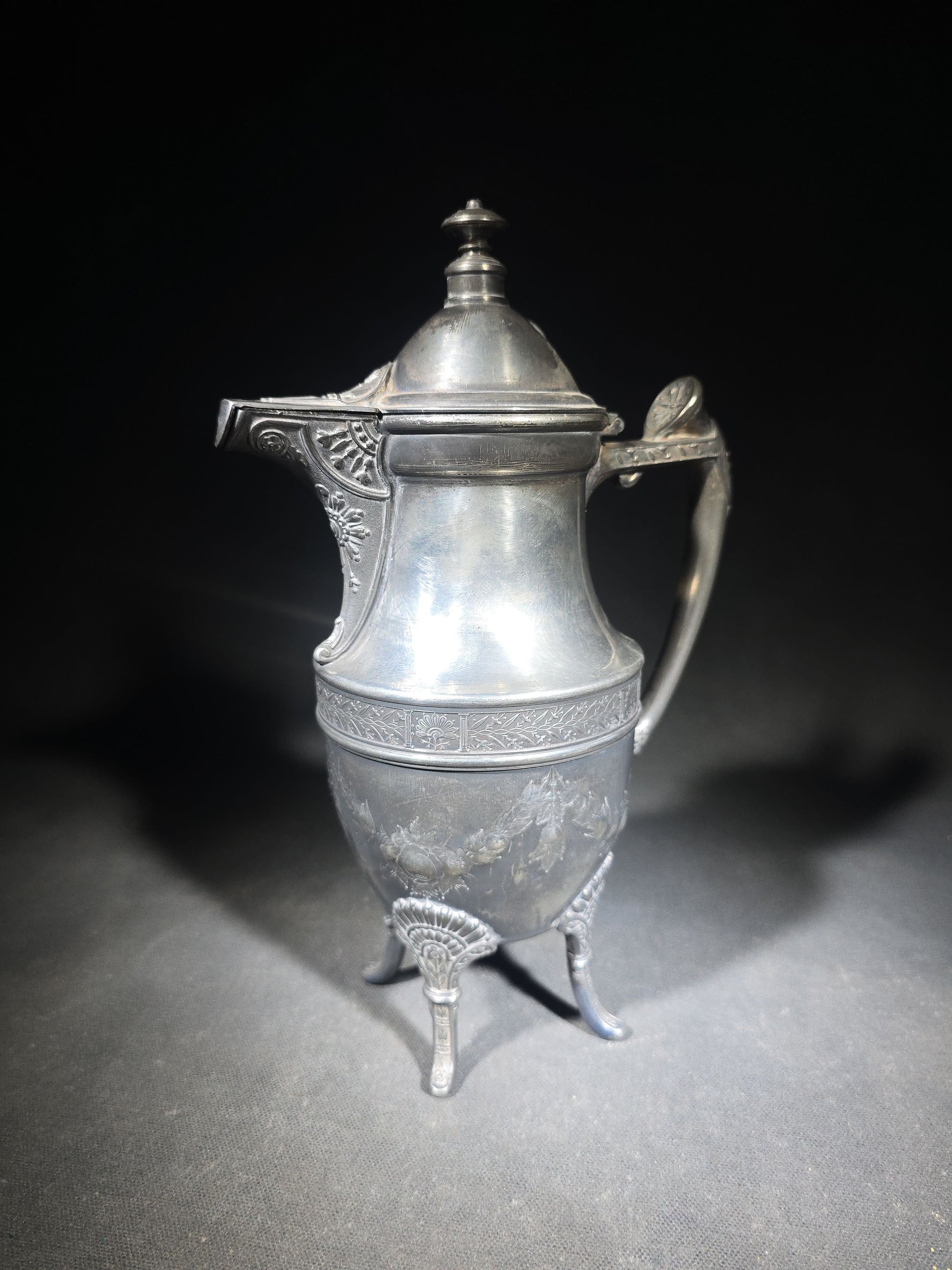 Pair of Antique Silverplate Serving Pieces including Reed & Barton Footed Coffeepot No. 2930 and Monogrammed Spherical Teapot with Lion Mask and Paw Feet