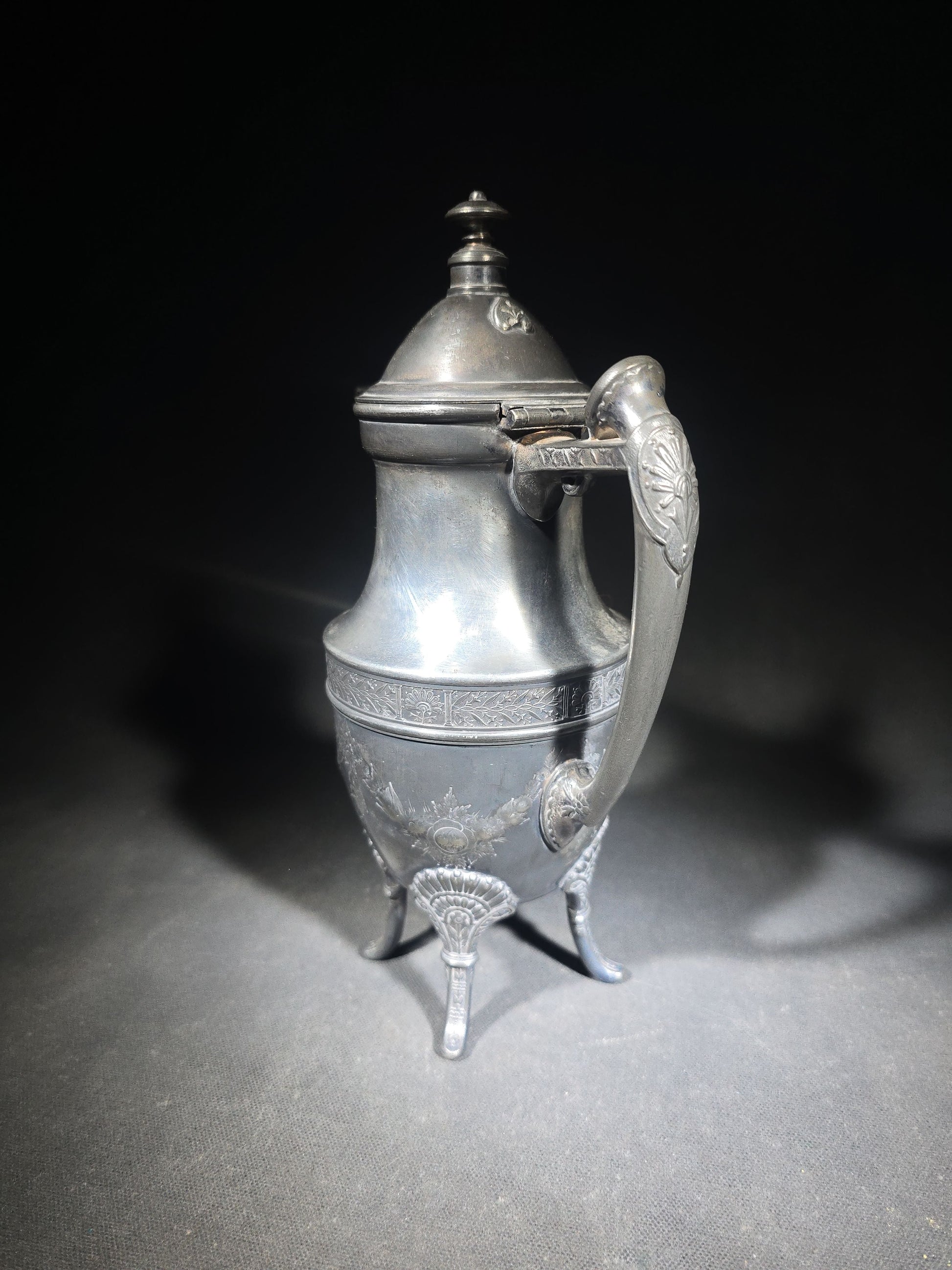 Pair of Antique Silverplate Serving Pieces including Reed & Barton Footed Coffeepot No. 2930 and Monogrammed Spherical Teapot with Lion Mask and Paw Feet