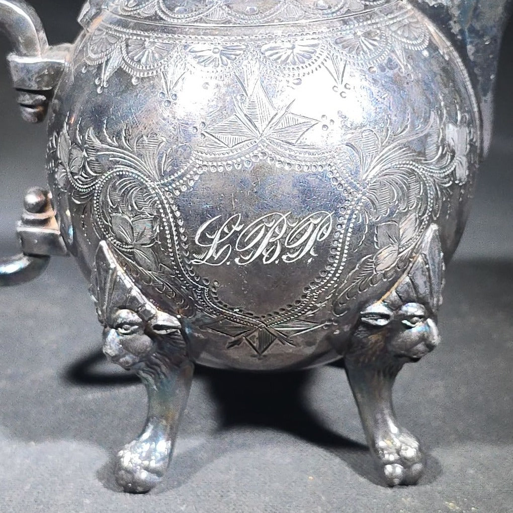 Pair of Antique Silverplate Serving Pieces including Reed & Barton Footed Coffeepot No. 2930 and Monogrammed Spherical Teapot with Lion Mask and Paw Feet