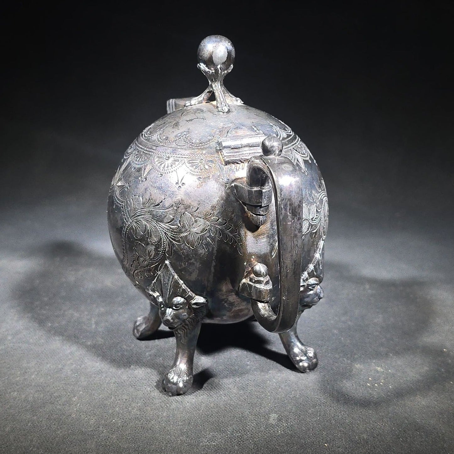 Pair of Antique Silverplate Serving Pieces including Reed & Barton Footed Coffeepot No. 2930 and Monogrammed Spherical Teapot with Lion Mask and Paw Feet