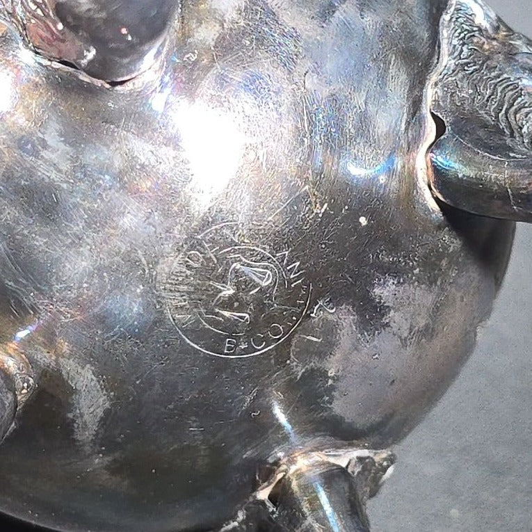 Pair of Antique Silverplate Serving Pieces including Reed & Barton Footed Coffeepot No. 2930 and Monogrammed Spherical Teapot with Lion Mask and Paw Feet