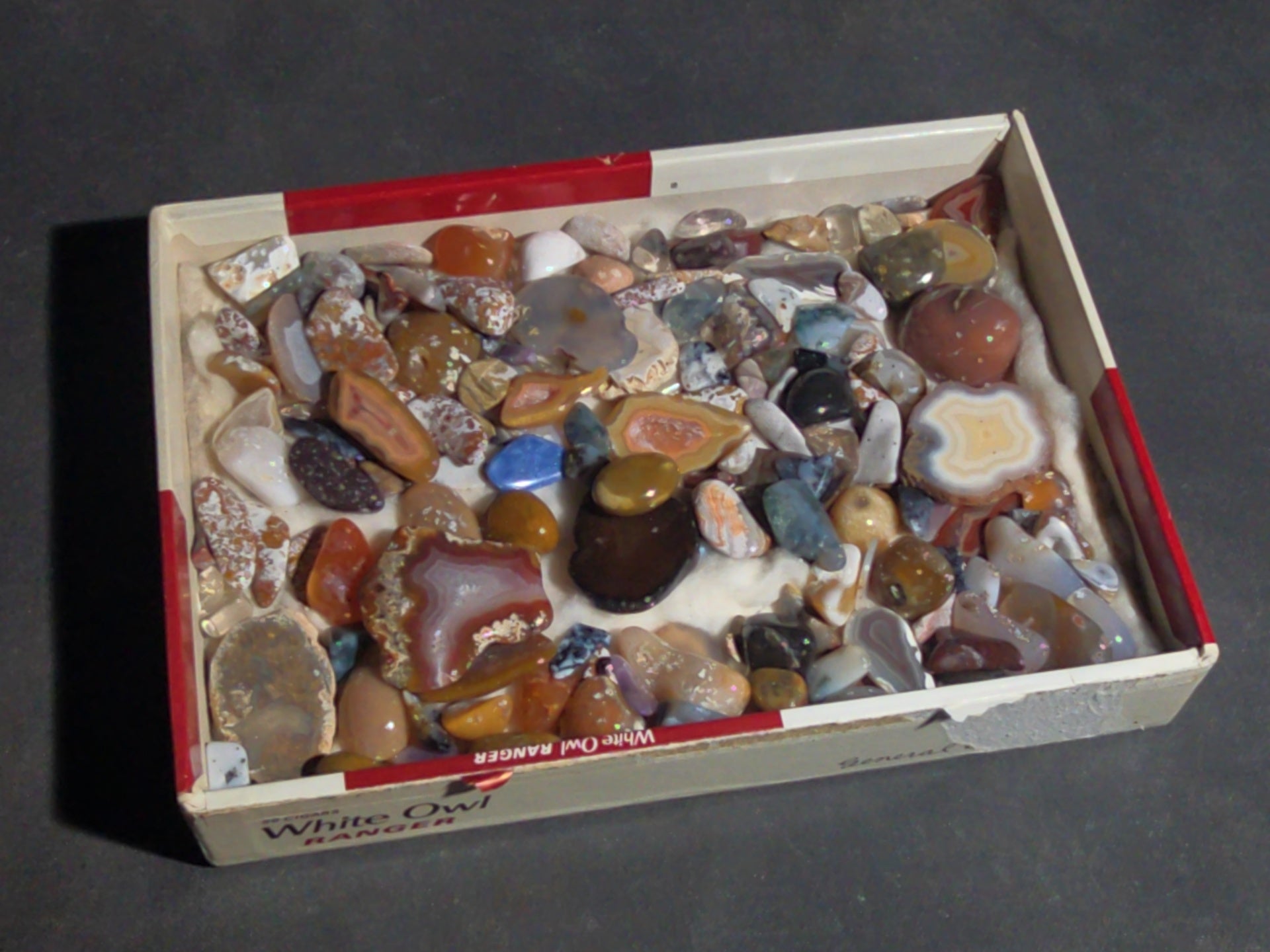 Grouping of Polished Stones and Mineral Specimens Including Agate Slices, Tumbled Agates, and Cabochons