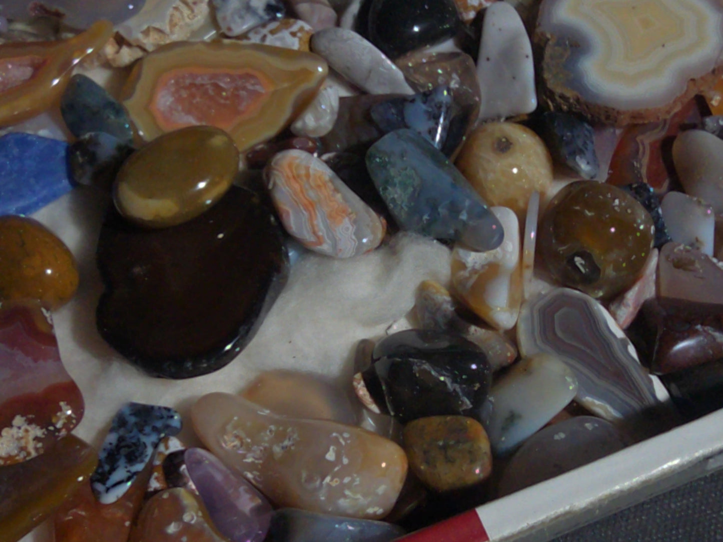 Grouping of Polished Stones and Mineral Specimens Including Agate Slices, Tumbled Agates, and Cabochons