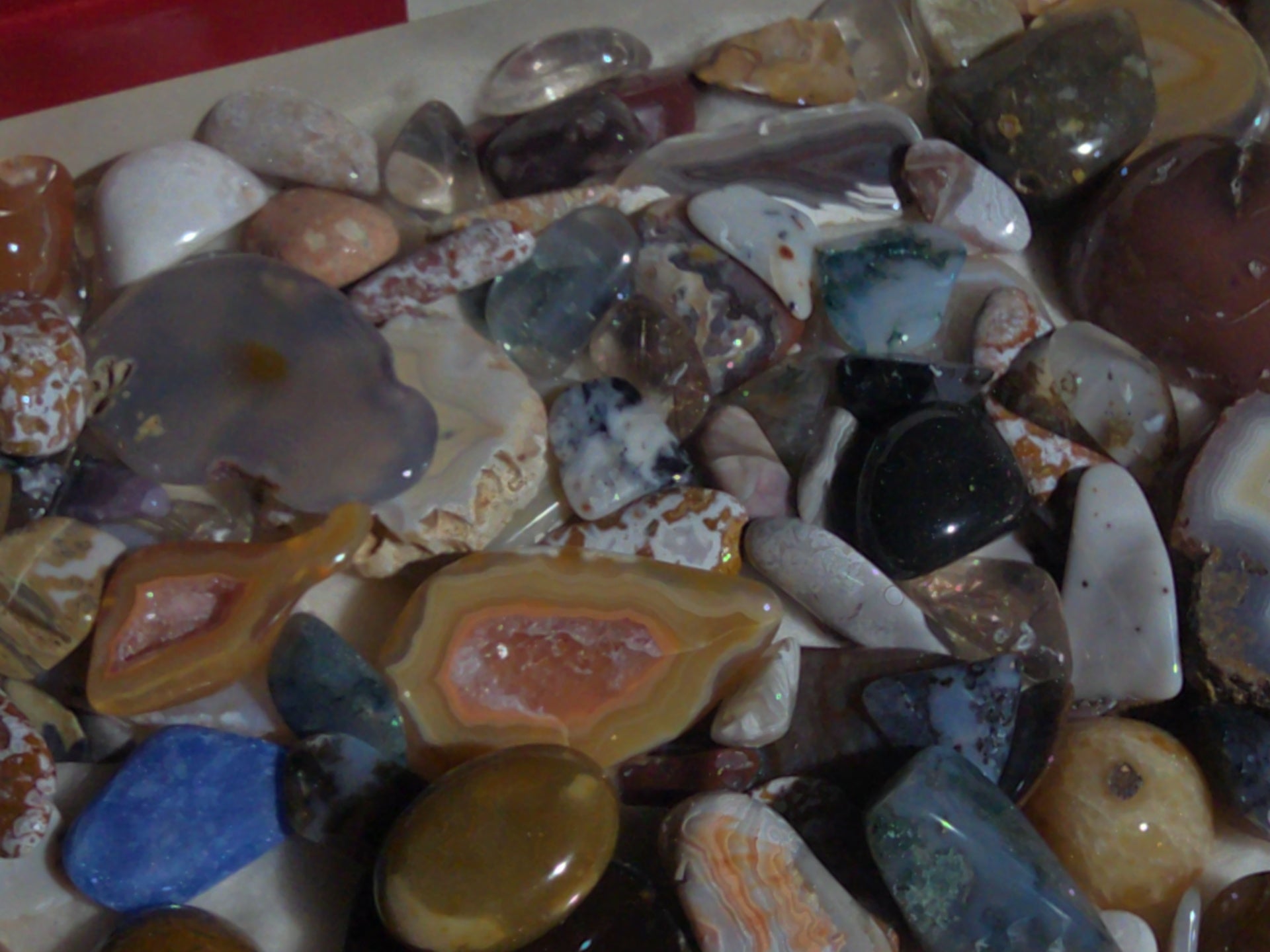 Grouping of Polished Stones and Mineral Specimens Including Agate Slices, Tumbled Agates, and Cabochons