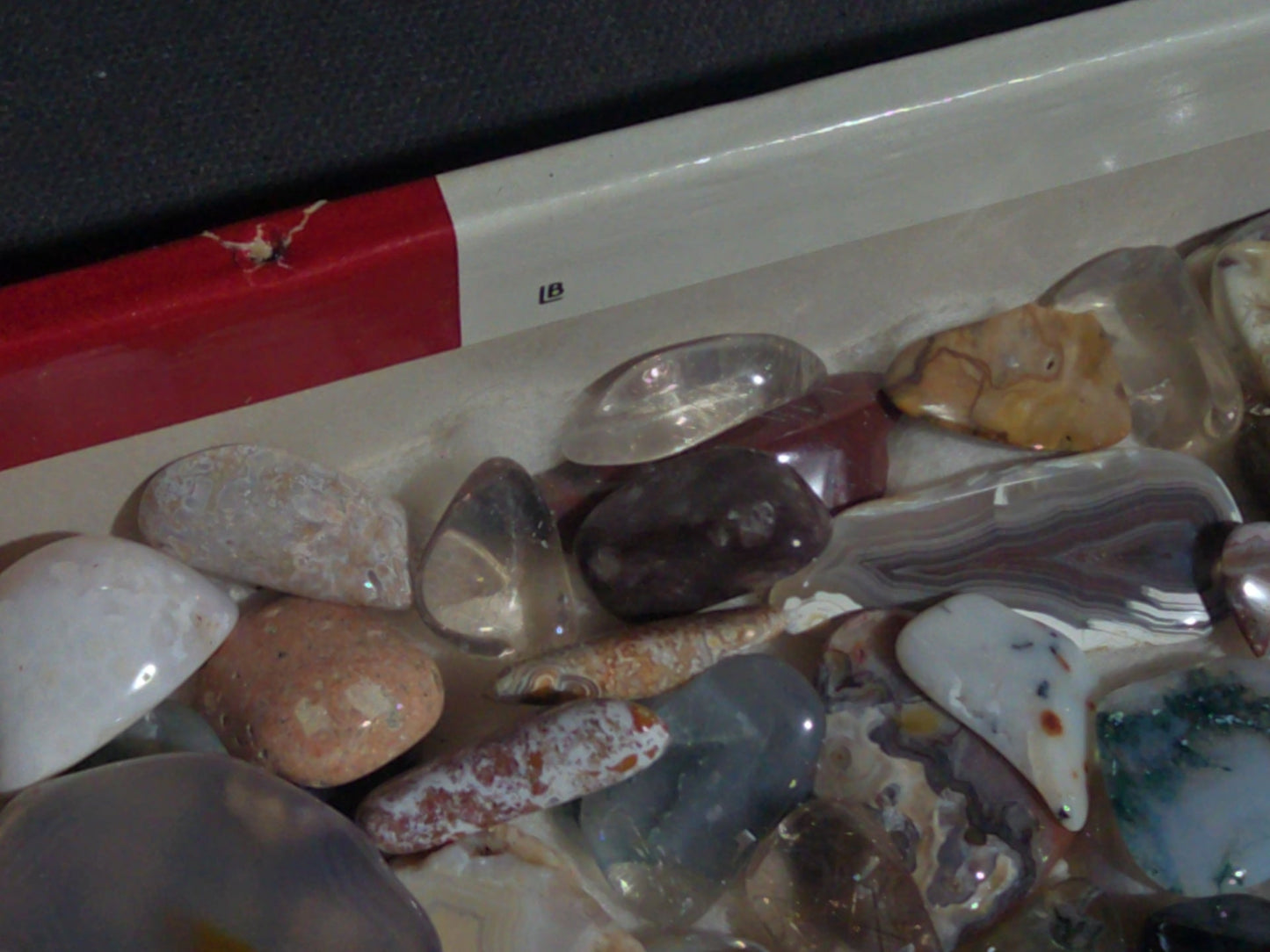 Grouping of Polished Stones and Mineral Specimens Including Agate Slices, Tumbled Agates, and Cabochons