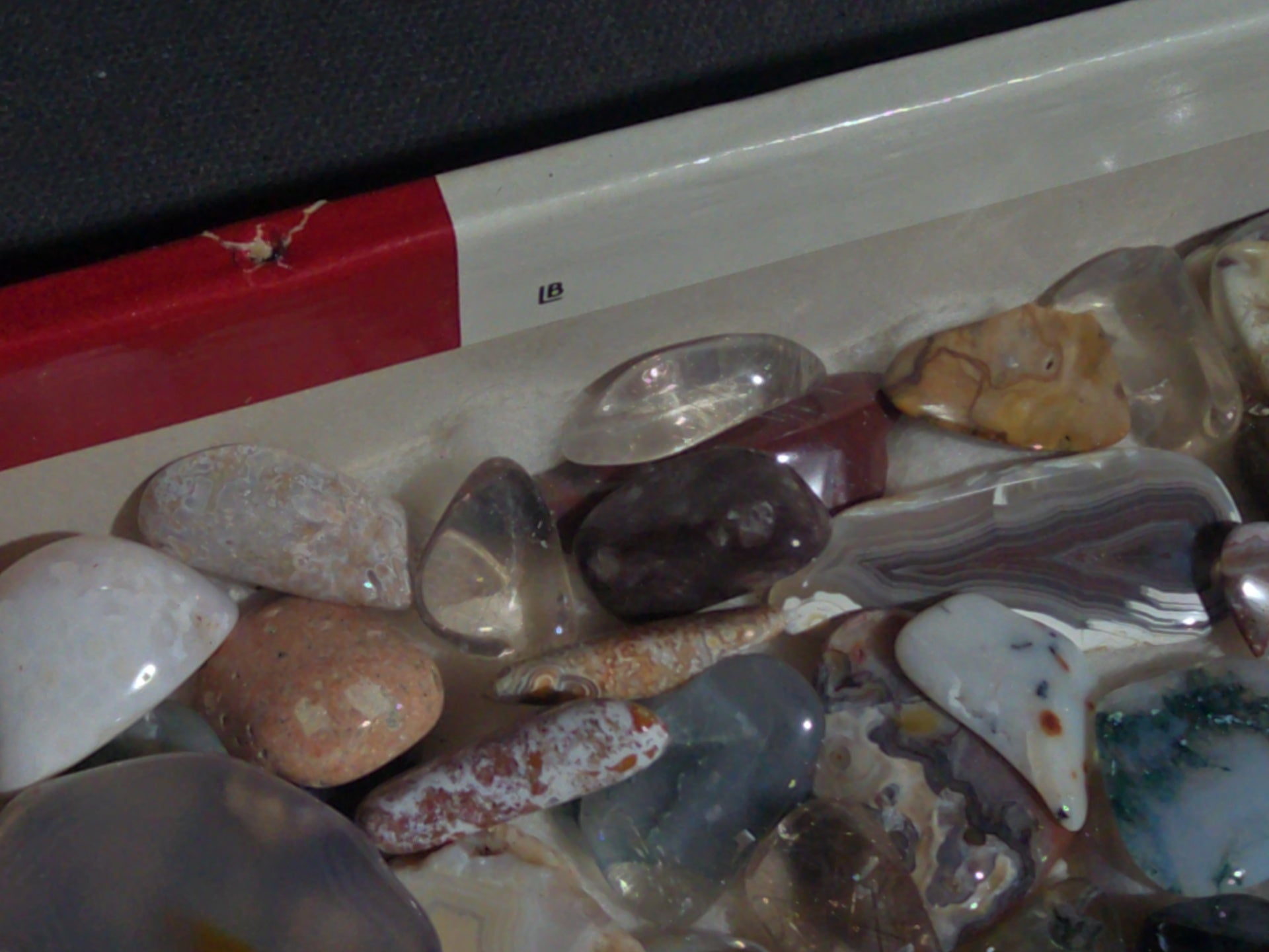 Grouping of Polished Stones and Mineral Specimens Including Agate Slices, Tumbled Agates, and Cabochons