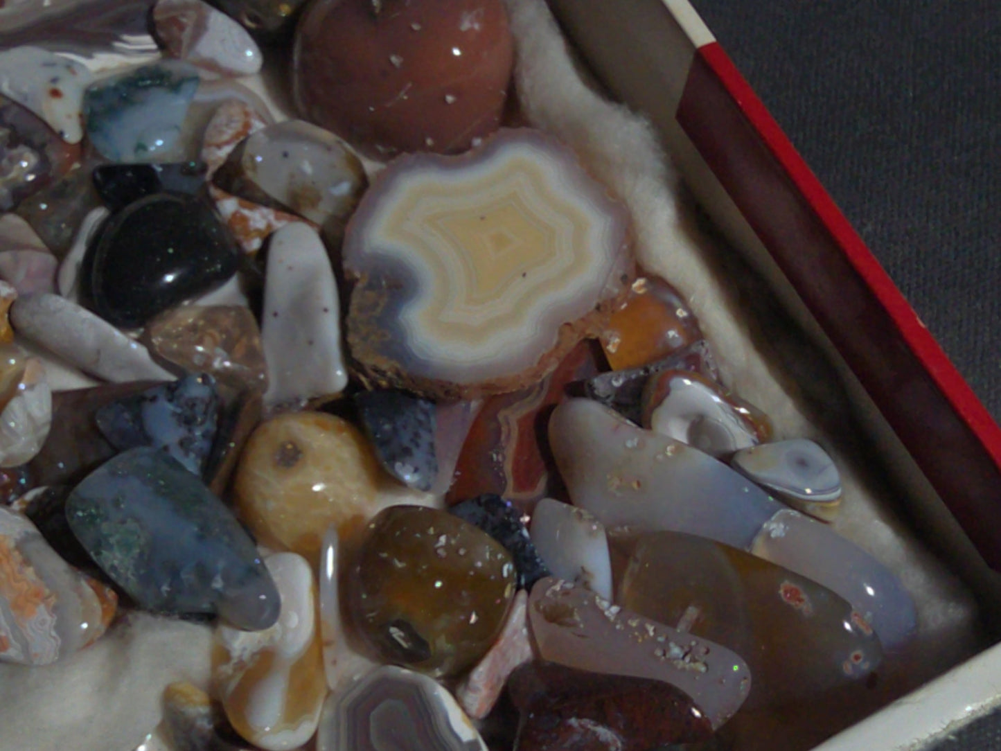 Grouping of Polished Stones and Mineral Specimens Including Agate Slices, Tumbled Agates, and Cabochons