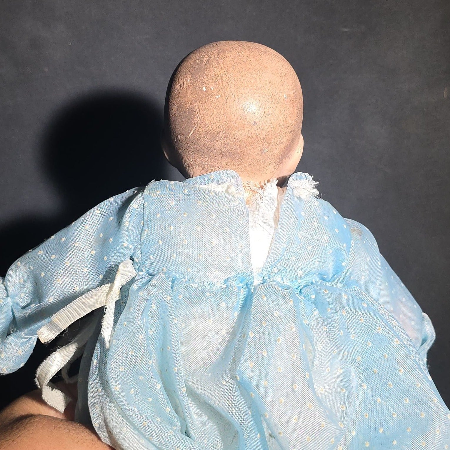 Modern Baby Doll in Blue Polka Dot Christening Gown with Painted Features and White Ribbon Bow