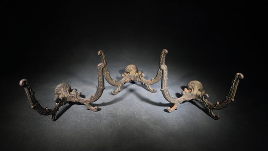 Trio of Antique Cast Iron Double Wall Hooks with Ornate Scroll Design, Note One with Loss