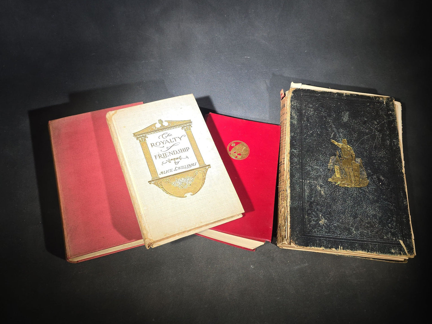 Grouping of Four Antique and Vintage Books including "The Royalty of Friendship" Inscribed to Actor William Gillette at the Garrick Theatre, New York City, 1906, "Captains Courageous" by Rudyard Kipling, and "Spinifex Walkabout"