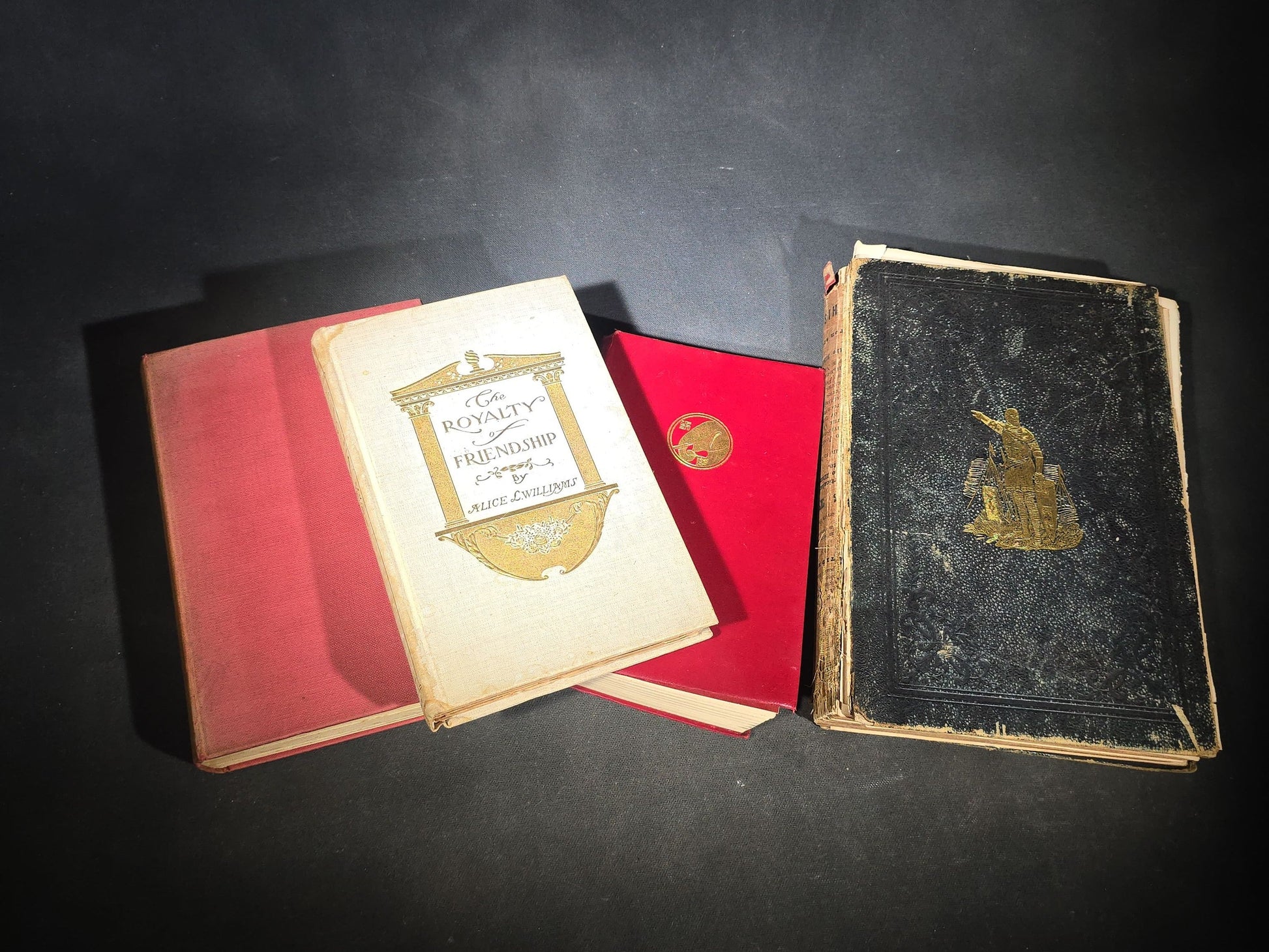 Grouping of Four Antique and Vintage Books including "The Royalty of Friendship" Inscribed to Actor William Gillette at the Garrick Theatre, New York City, 1906, "Captains Courageous" by Rudyard Kipling, and "Spinifex Walkabout"
