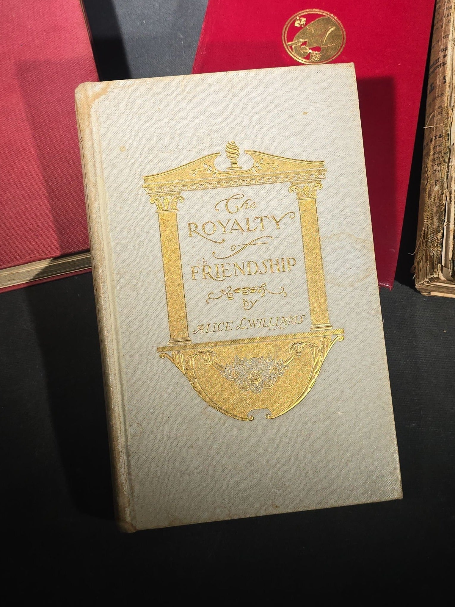 Grouping of Four Antique and Vintage Books including "The Royalty of Friendship" Inscribed to Actor William Gillette at the Garrick Theatre, New York City, 1906, "Captains Courageous" by Rudyard Kipling, and "Spinifex Walkabout"
