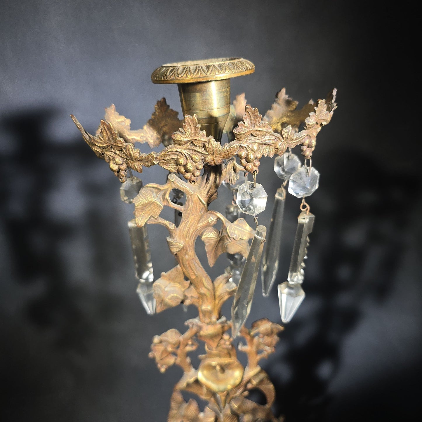 Antique Gilt Brass Girandole Candlestick with Crystal Prisms on Marble Base, Grapevine and Floral Motif, Missing Some Crystals