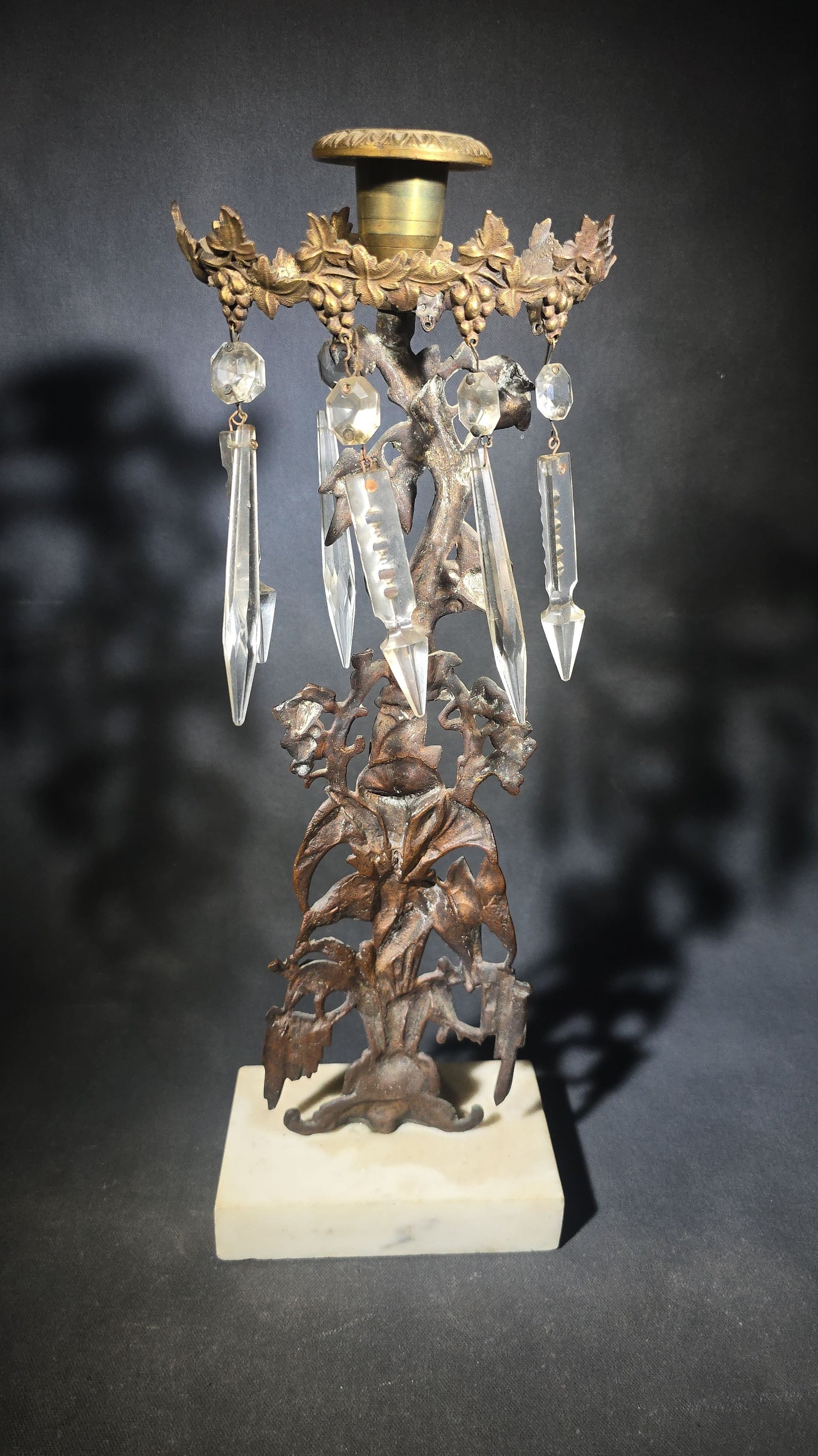Antique Gilt Brass Girandole Candlestick with Crystal Prisms on Marble Base, Grapevine and Floral Motif, Missing Some Crystals