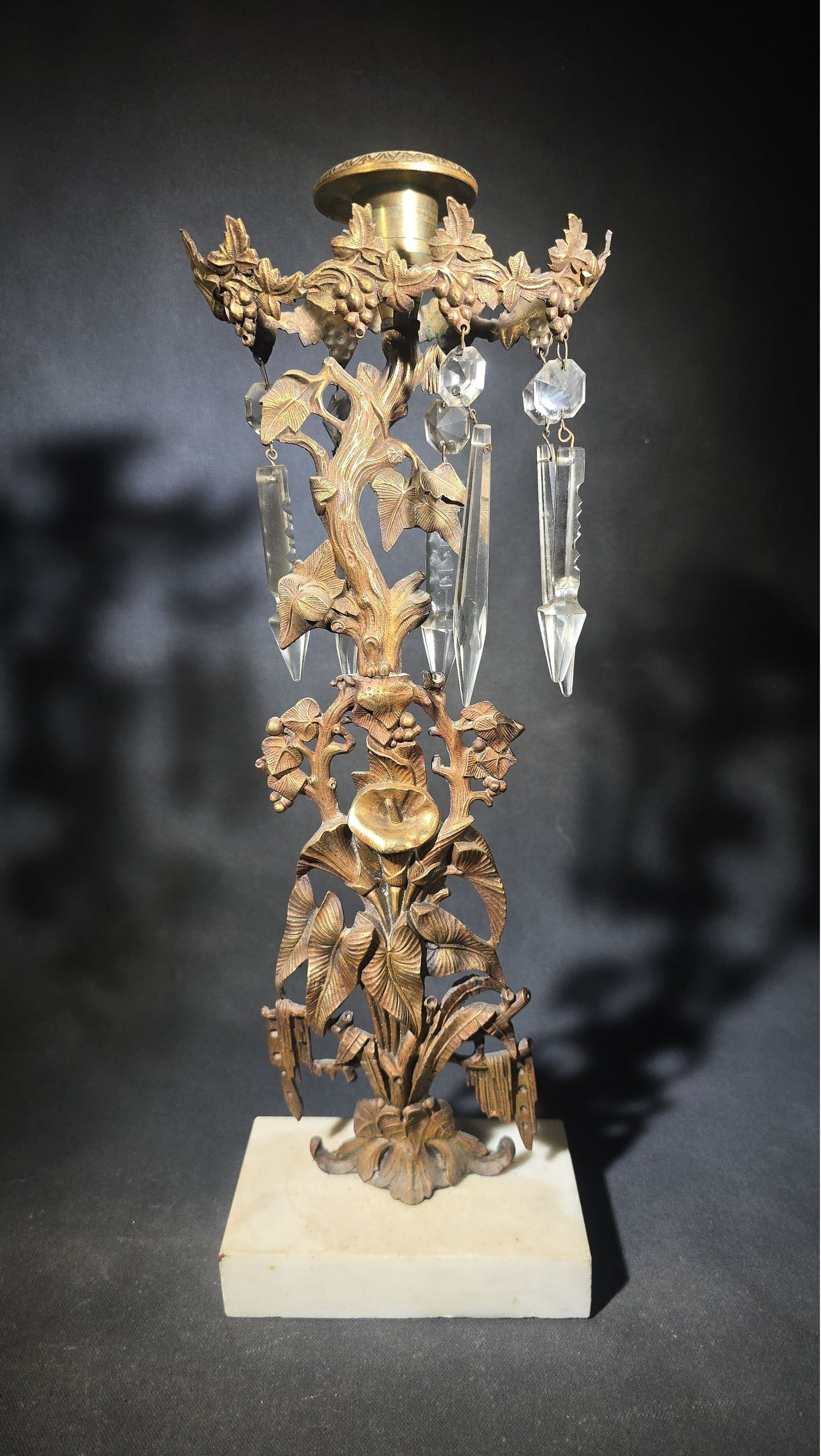 Antique Gilt Brass Girandole Candlestick with Crystal Prisms on Marble Base, Grapevine and Floral Motif, Missing Some Crystals