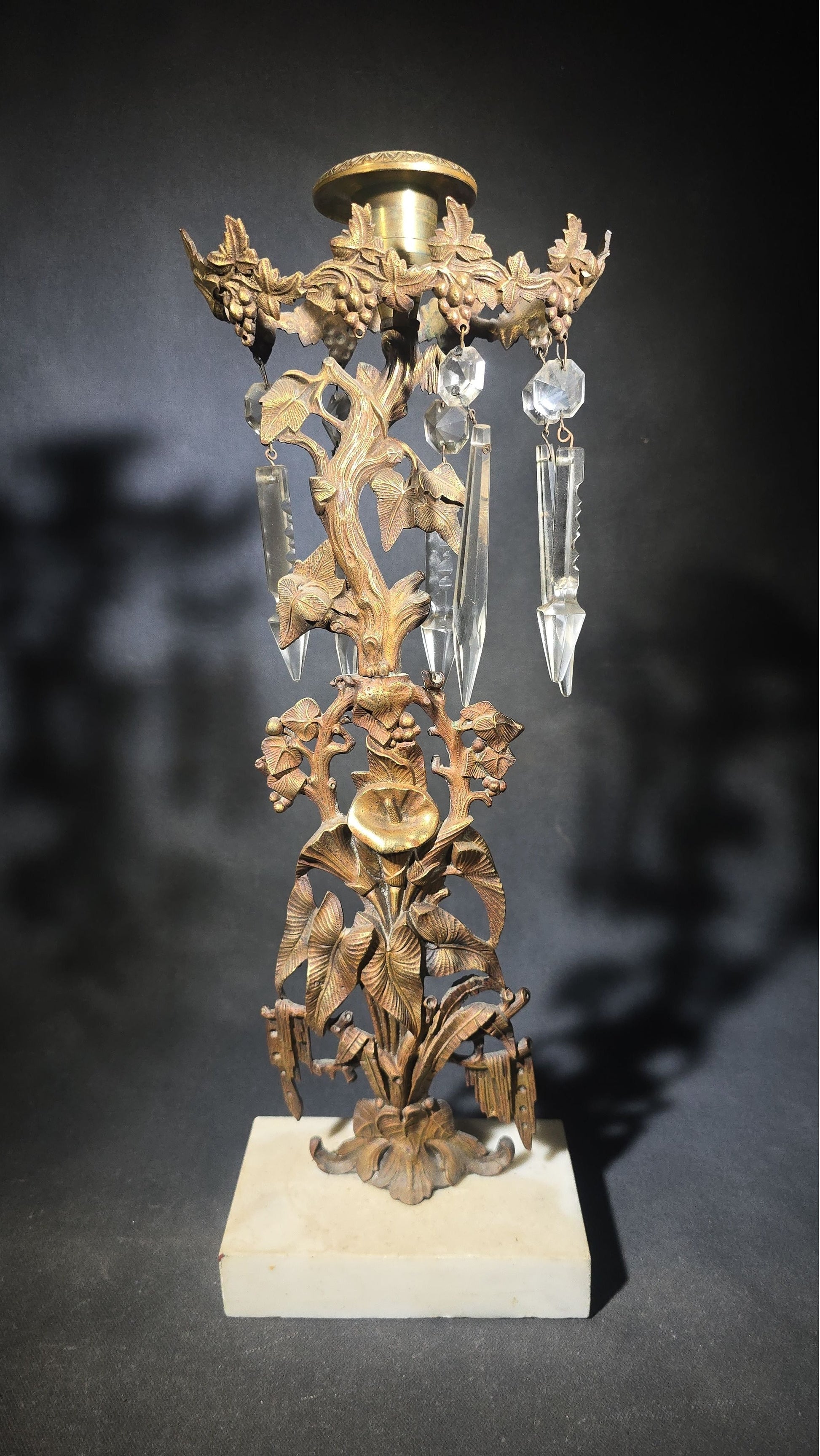 Antique Gilt Brass Girandole Candlestick with Crystal Prisms on Marble Base, Grapevine and Floral Motif, Missing Some Crystals
