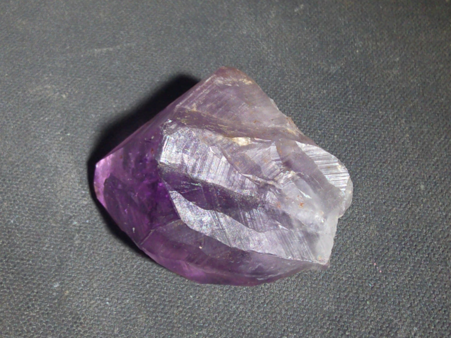 Trio of Quartz Crystal Specimens including Amethyst Point and Two Clear Quartz Points