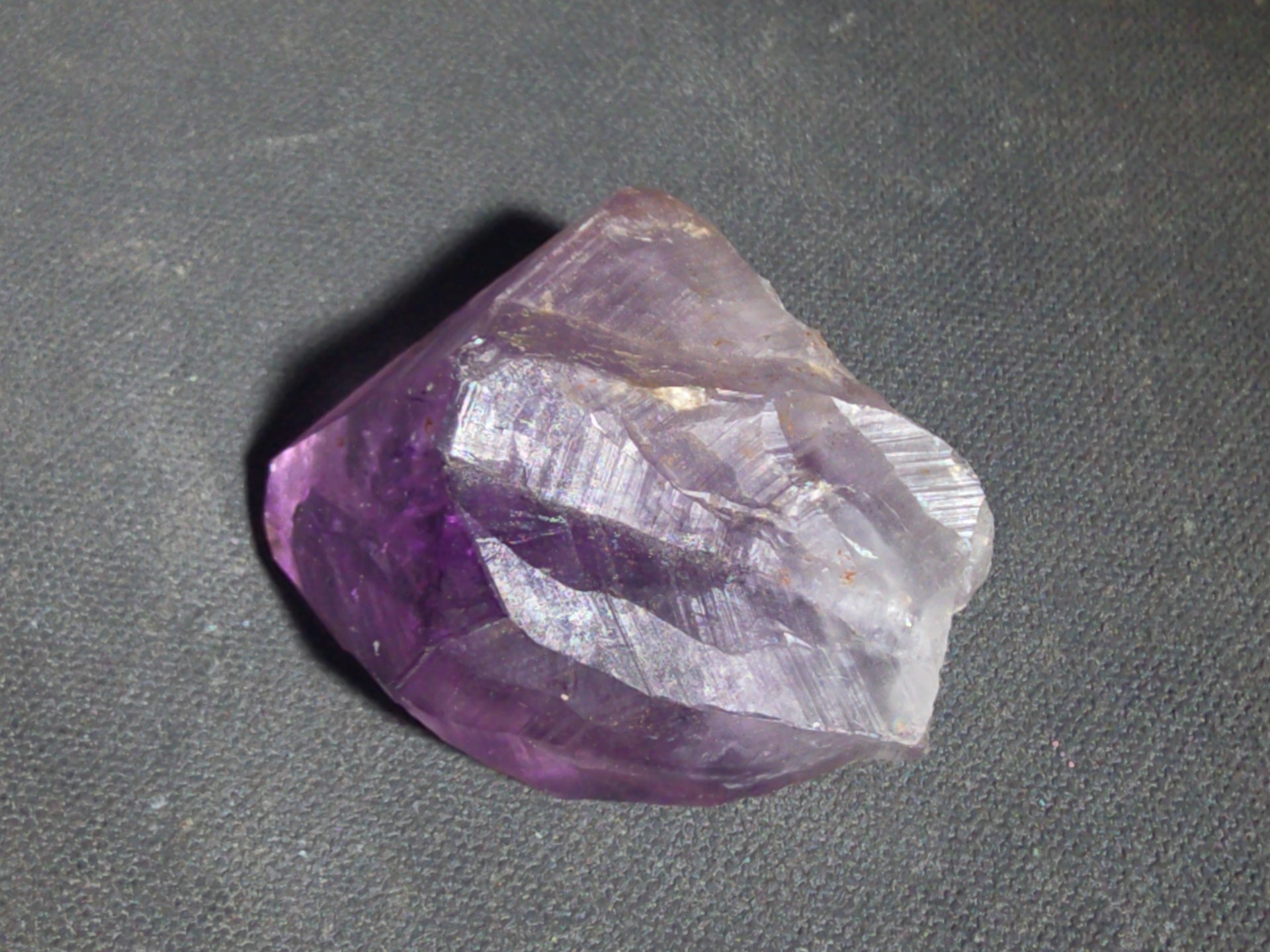 Trio of Quartz Crystal Specimens including Amethyst Point and Two Clear Quartz Points