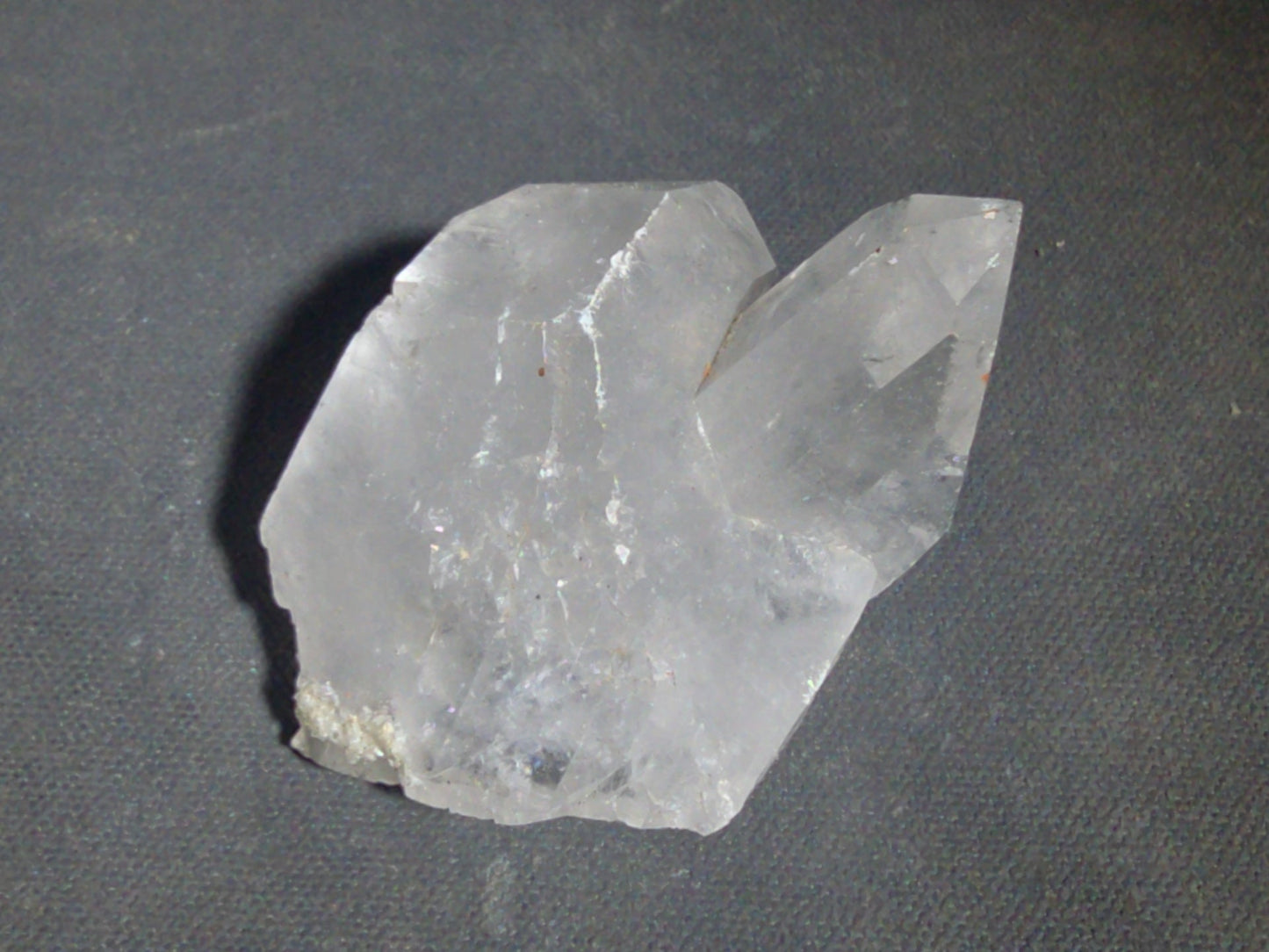 Trio of Quartz Crystal Specimens including Amethyst Point and Two Clear Quartz Points