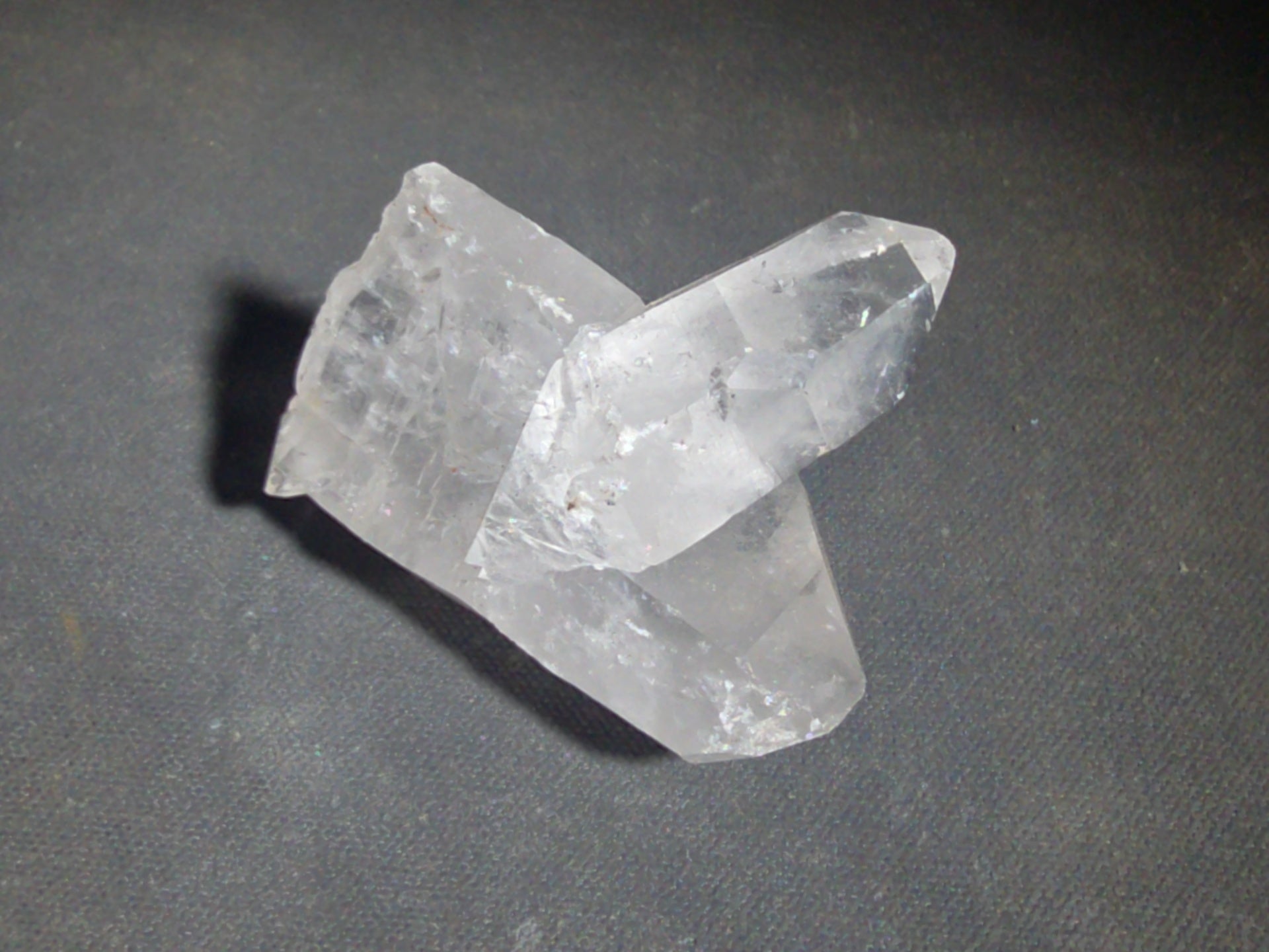 Trio of Quartz Crystal Specimens including Amethyst Point and Two Clear Quartz Points