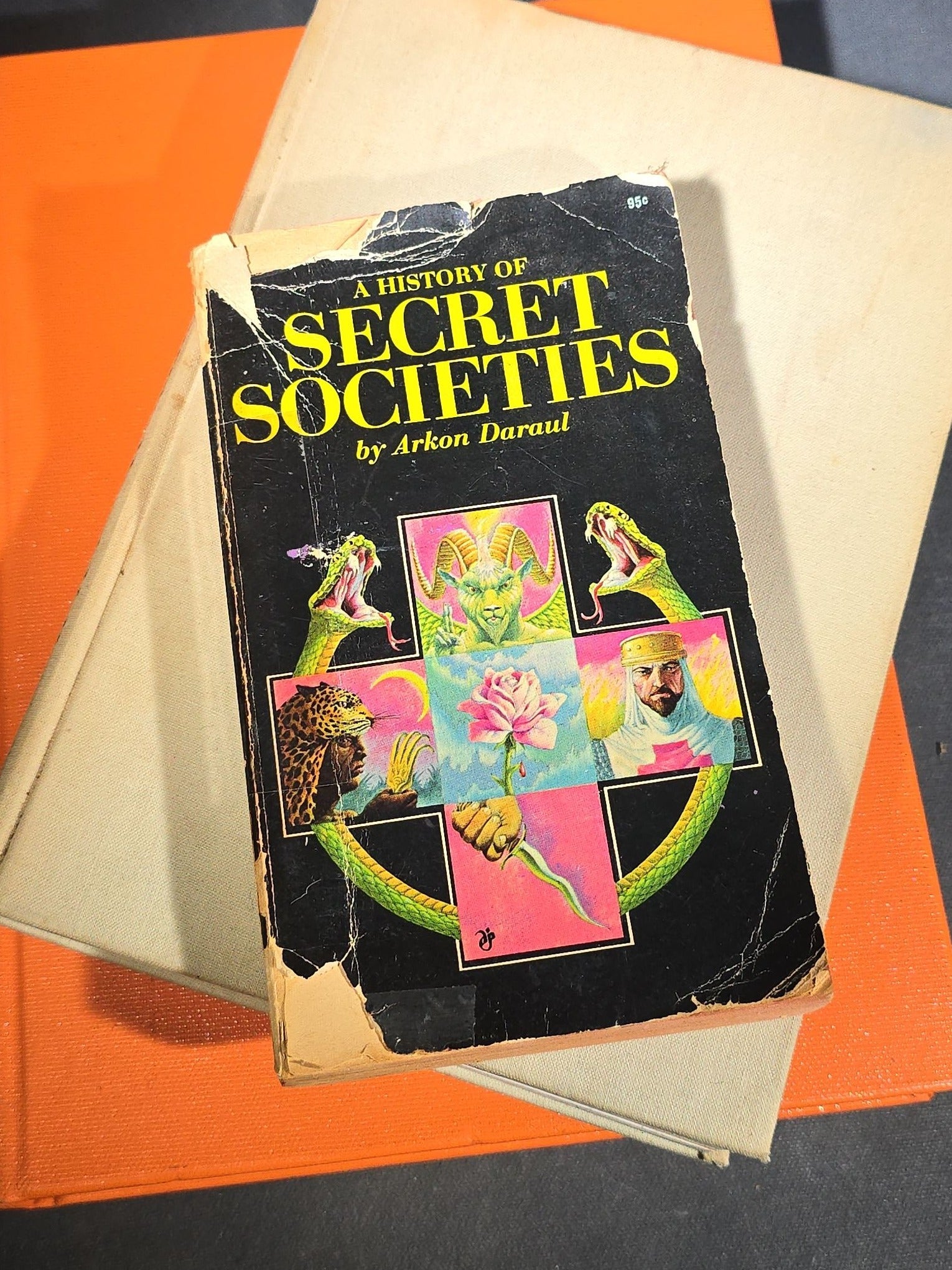 Grouping of Four Antique and Vintage Books including "The Microscope and Its Revelations" by William B. Carpenter, "They Called It Purple Heart Valley" by Margaret Bourke-White, "The Encyclopedia of UFOs," and "A History of Secret Societies"