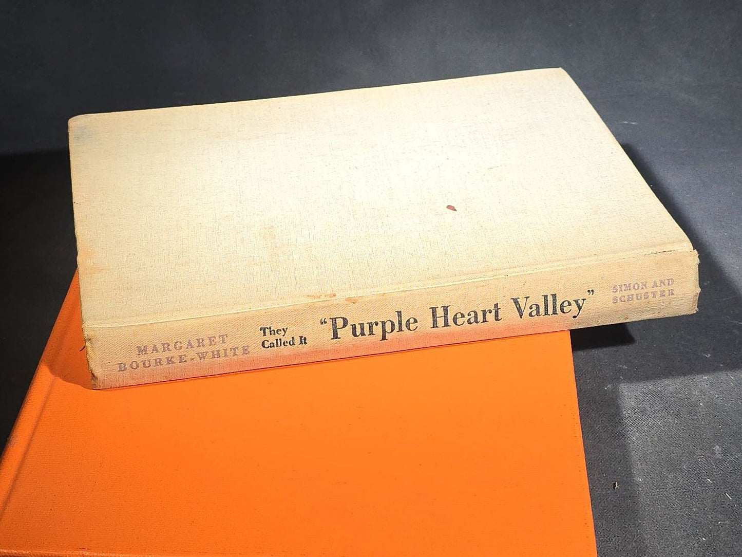 Grouping of Four Antique and Vintage Books including "The Microscope and Its Revelations" by William B. Carpenter, "They Called It Purple Heart Valley" by Margaret Bourke-White, "The Encyclopedia of UFOs," and "A History of Secret Societies"