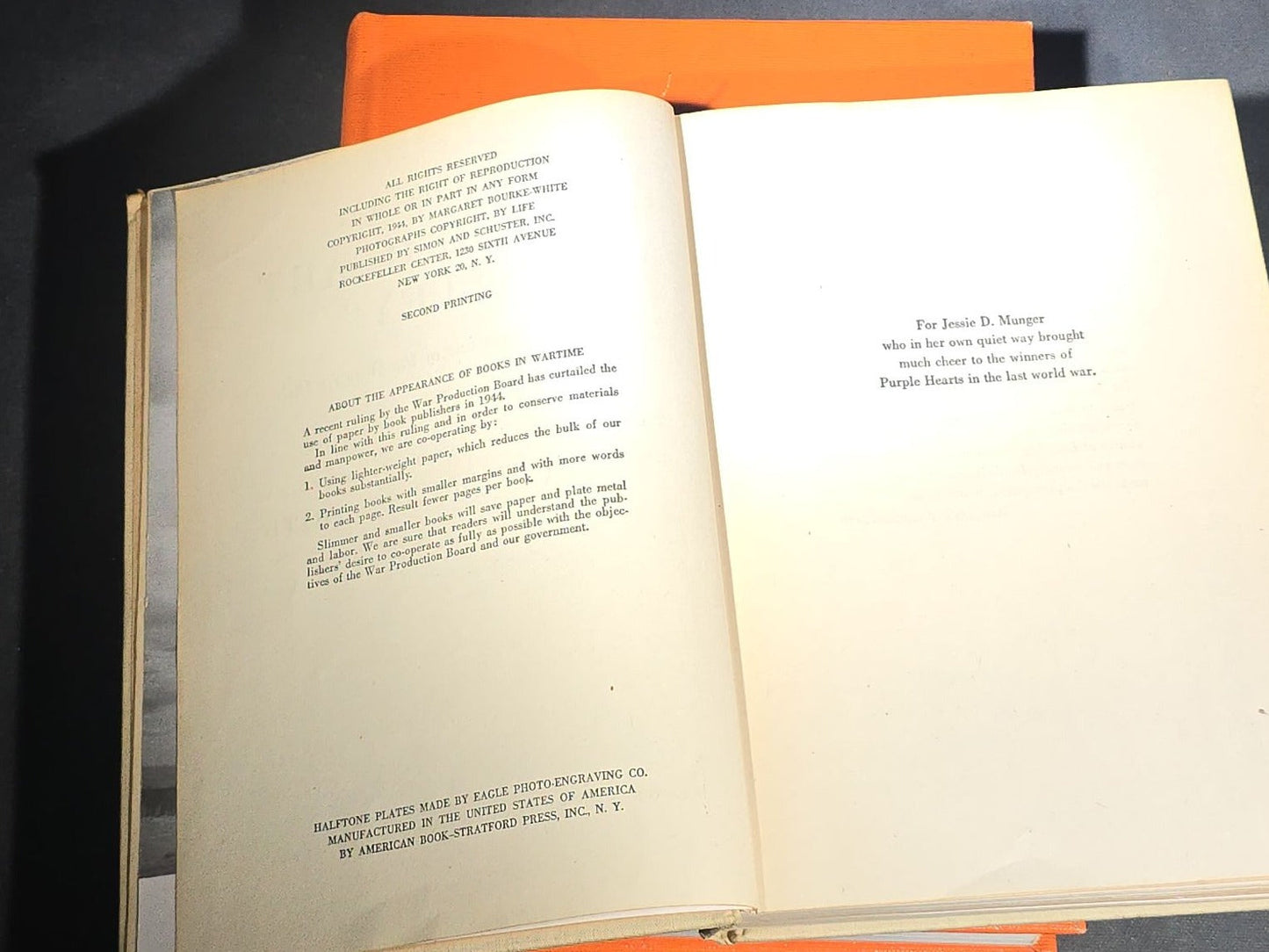 Grouping of Four Antique and Vintage Books including "The Microscope and Its Revelations" by William B. Carpenter, "They Called It Purple Heart Valley" by Margaret Bourke-White, "The Encyclopedia of UFOs," and "A History of Secret Societies"