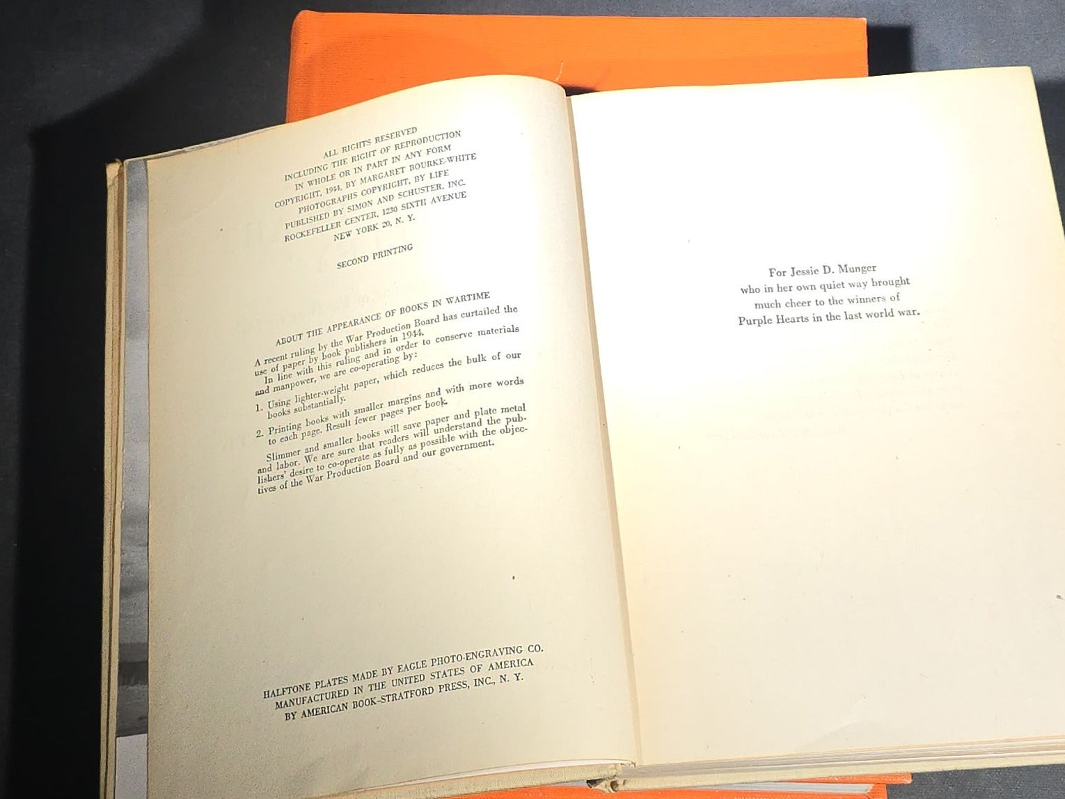 Grouping of Four Antique and Vintage Books including "The Microscope and Its Revelations" by William B. Carpenter, "They Called It Purple Heart Valley" by Margaret Bourke-White, "The Encyclopedia of UFOs," and "A History of Secret Societies"