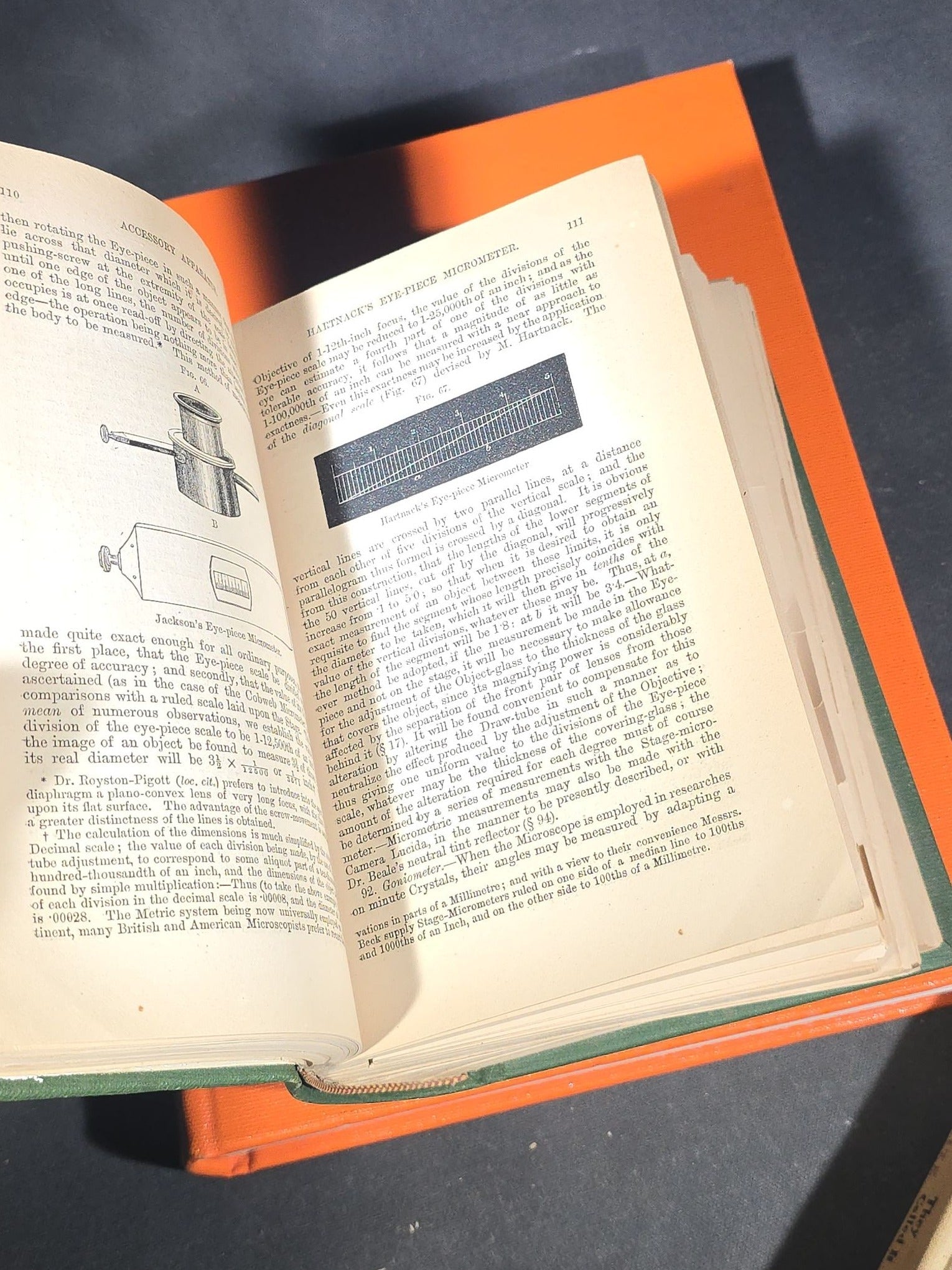 Grouping of Four Antique and Vintage Books including "The Microscope and Its Revelations" by William B. Carpenter, "They Called It Purple Heart Valley" by Margaret Bourke-White, "The Encyclopedia of UFOs," and "A History of Secret Societies"