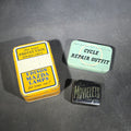 Lot 157 - Grouping of Four Vintage Advertising Items Including Edison Mazda Lamps Automotive Bulb Tin, Weldtite Self Vulcanising Cycle Repair Outfit Tin, Movielets Film Strip Tin, and Esso Tiger Keychain