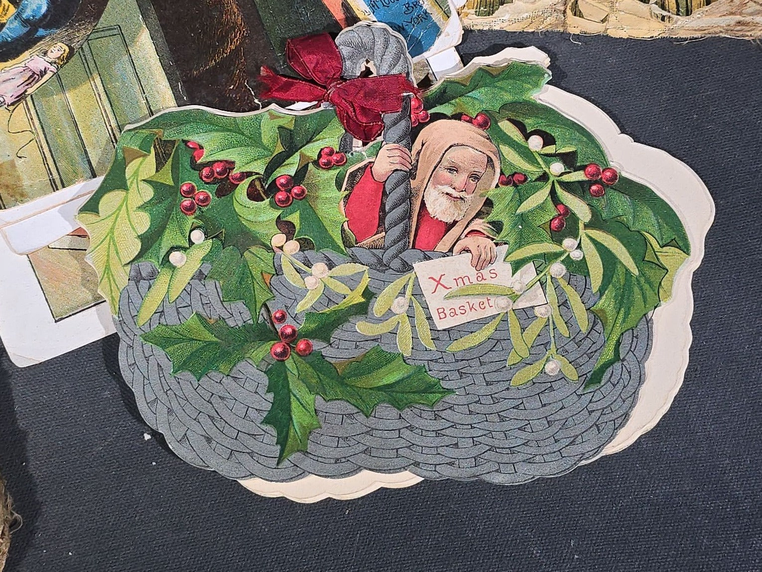 Grouping of Antique Craft Grade Illustrated Children's Books including "The Christmas Basket" by Mrs. Martha J. Lamb (1882), "Santa Claus & His Works" by McLoughlin Bros., "The Night Before Christmas," and Dean's Rag Book "Pets"