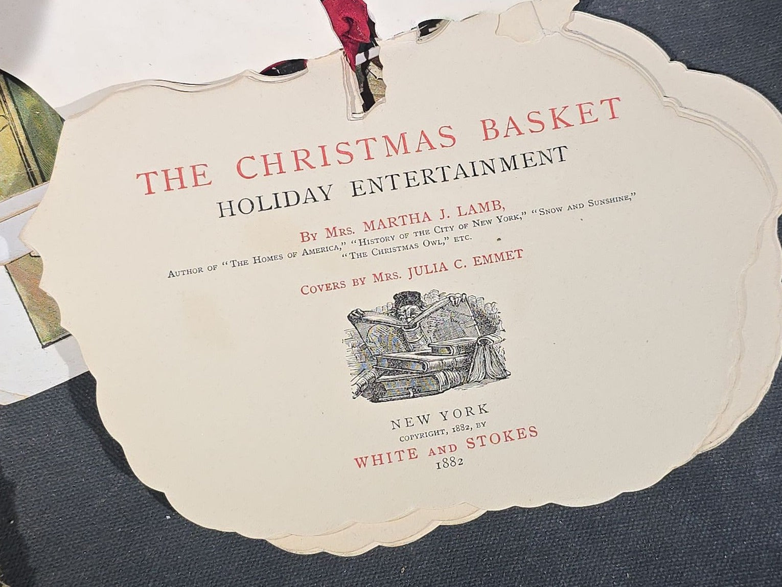Grouping of Antique Craft Grade Illustrated Children's Books including "The Christmas Basket" by Mrs. Martha J. Lamb (1882), "Santa Claus & His Works" by McLoughlin Bros., "The Night Before Christmas," and Dean's Rag Book "Pets"