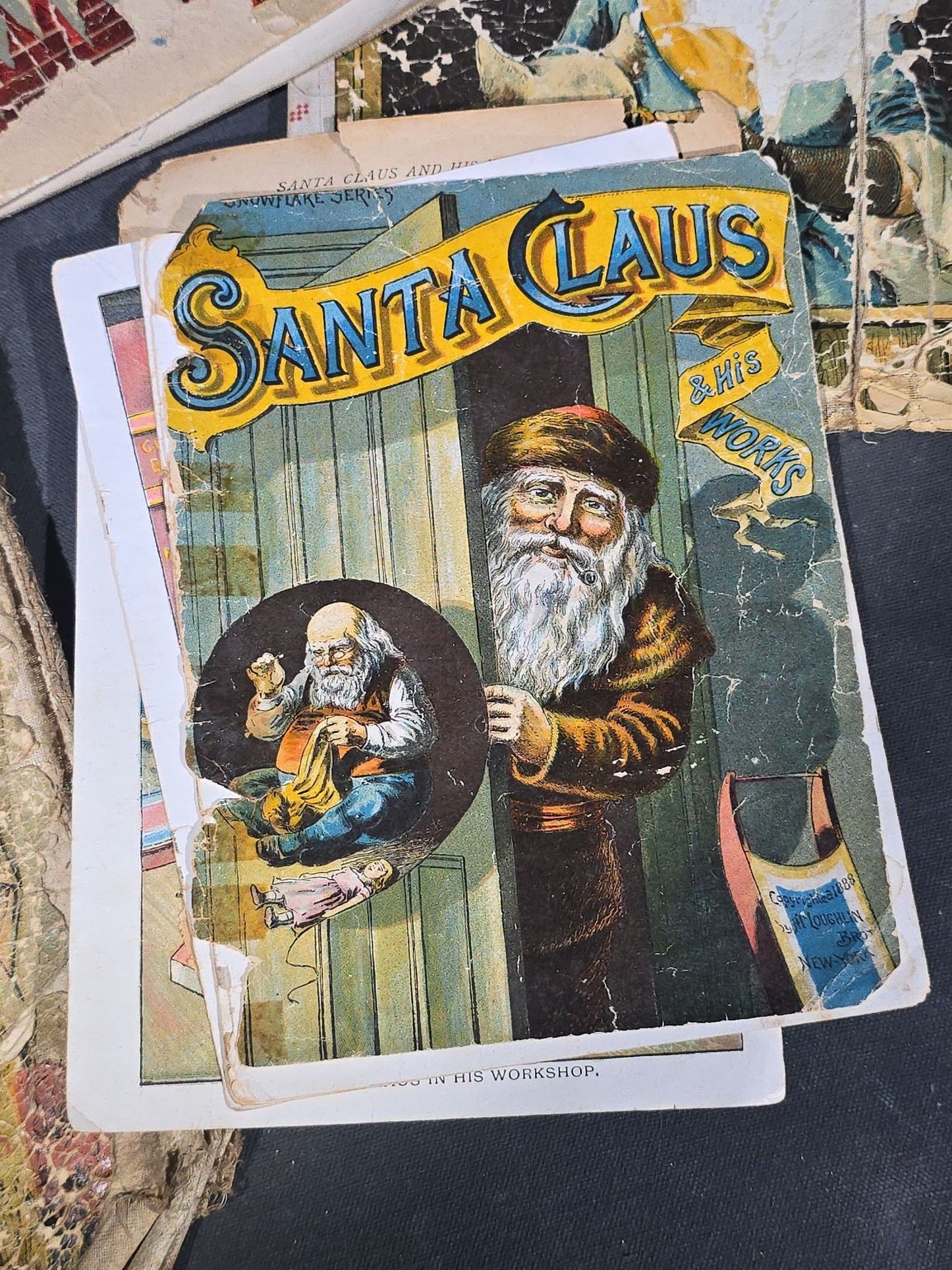 Grouping of Antique Craft Grade Illustrated Children's Books including "The Christmas Basket" by Mrs. Martha J. Lamb (1882), "Santa Claus & His Works" by McLoughlin Bros., "The Night Before Christmas," and Dean's Rag Book "Pets"