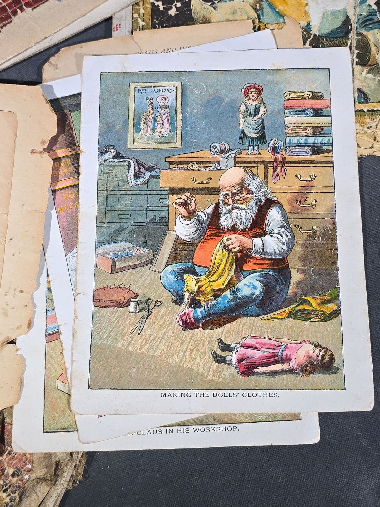 Grouping of Antique Craft Grade Illustrated Children's Books including "The Christmas Basket" by Mrs. Martha J. Lamb (1882), "Santa Claus & His Works" by McLoughlin Bros., "The Night Before Christmas," and Dean's Rag Book "Pets"