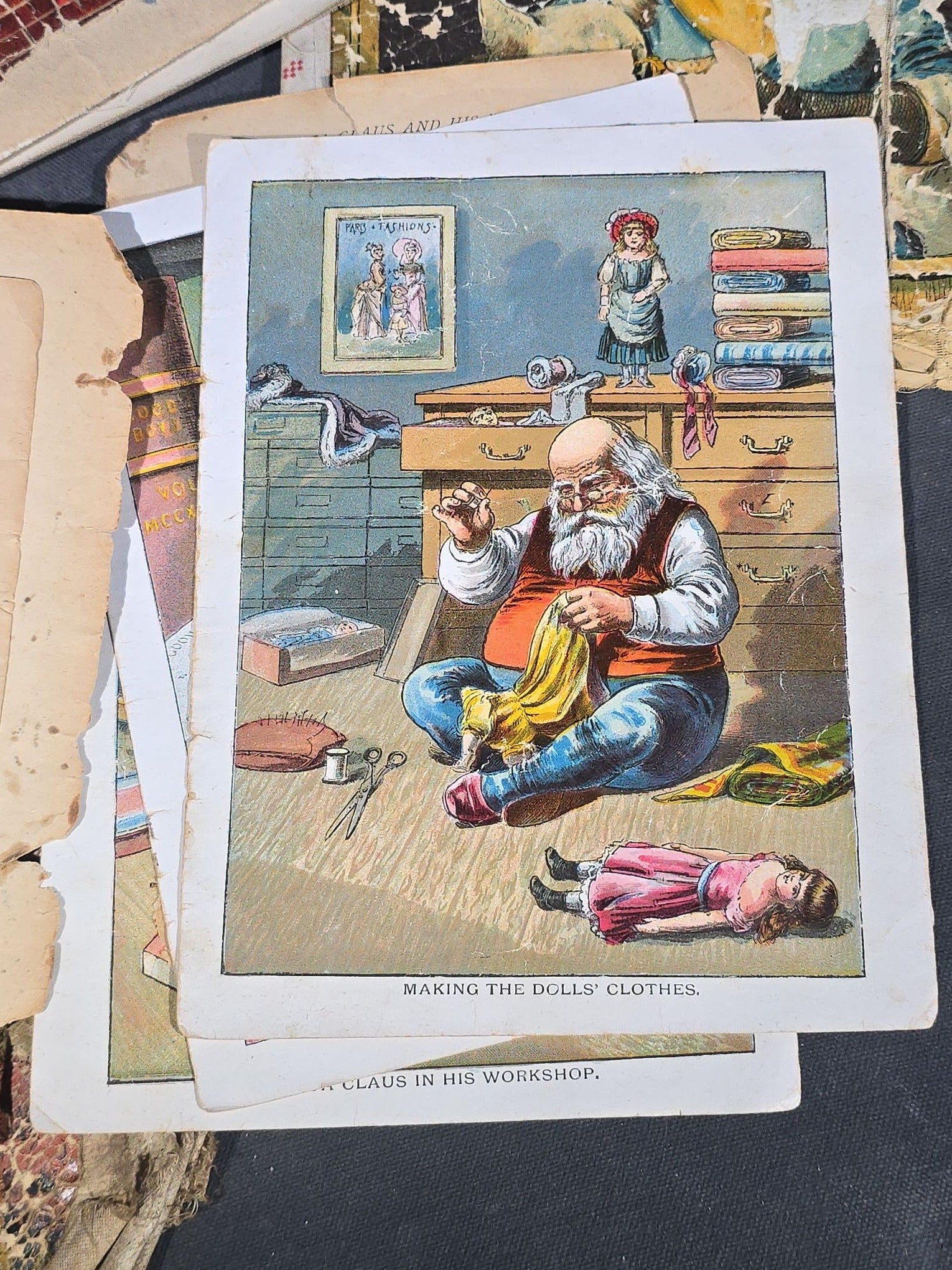 Grouping of Antique Craft Grade Illustrated Children's Books including "The Christmas Basket" by Mrs. Martha J. Lamb (1882), "Santa Claus & His Works" by McLoughlin Bros., "The Night Before Christmas," and Dean's Rag Book "Pets"