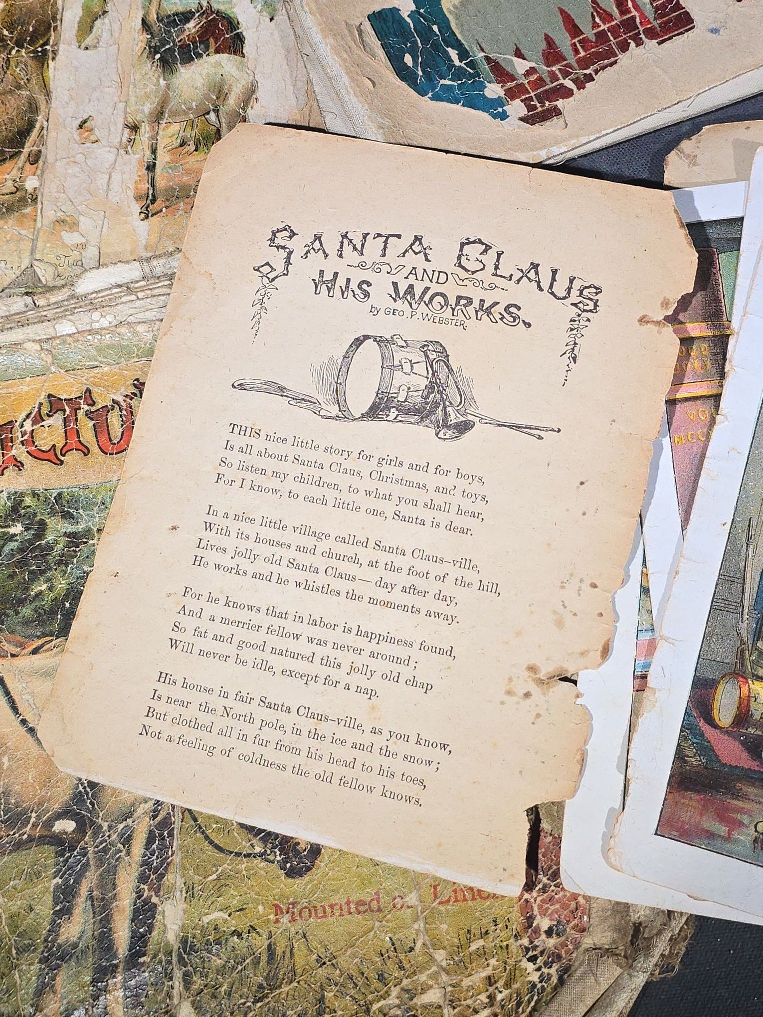 Grouping of Antique Craft Grade Illustrated Children's Books including "The Christmas Basket" by Mrs. Martha J. Lamb (1882), "Santa Claus & His Works" by McLoughlin Bros., "The Night Before Christmas," and Dean's Rag Book "Pets"