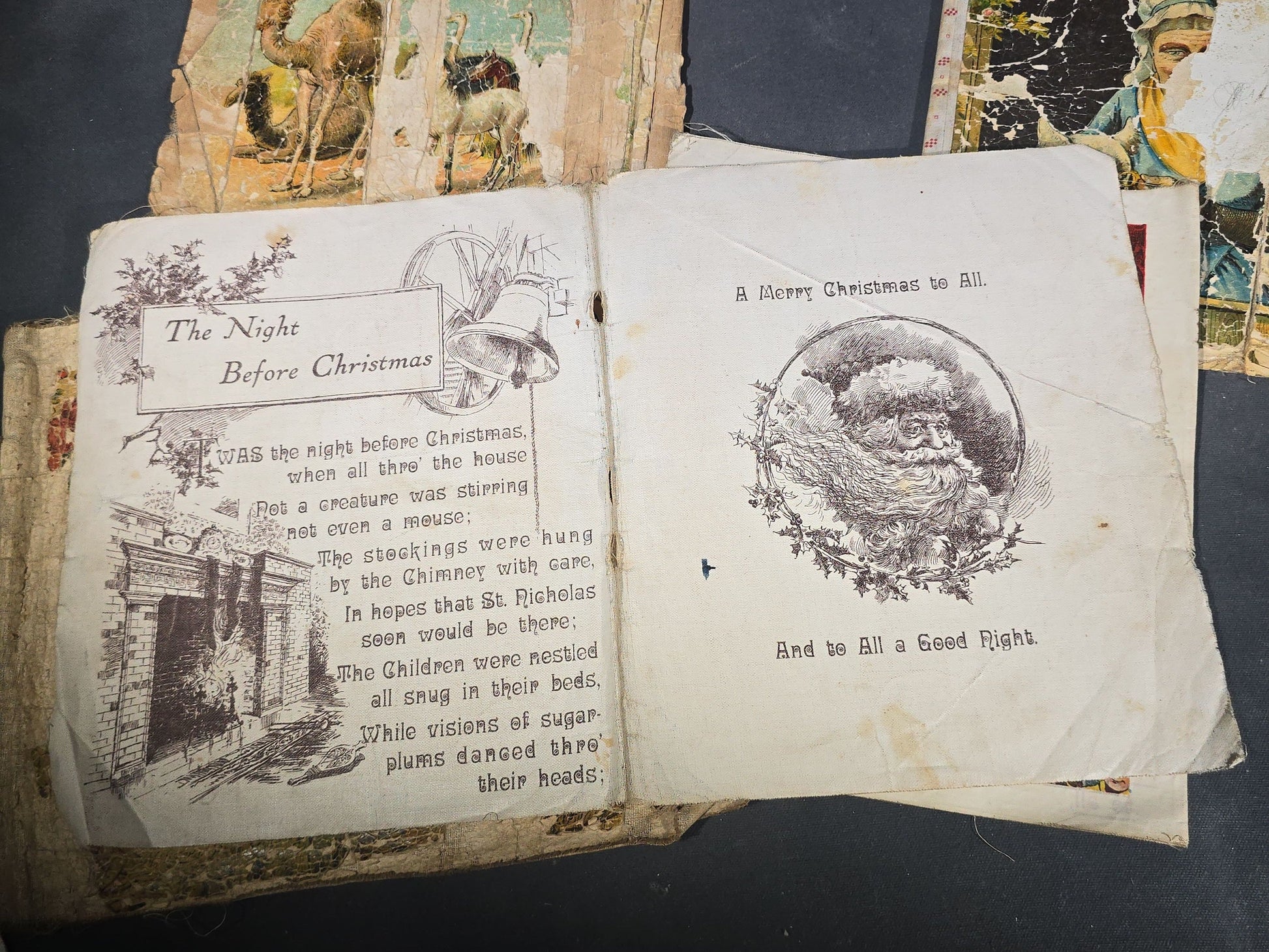 Grouping of Antique Craft Grade Illustrated Children's Books including "The Christmas Basket" by Mrs. Martha J. Lamb (1882), "Santa Claus & His Works" by McLoughlin Bros., "The Night Before Christmas," and Dean's Rag Book "Pets"