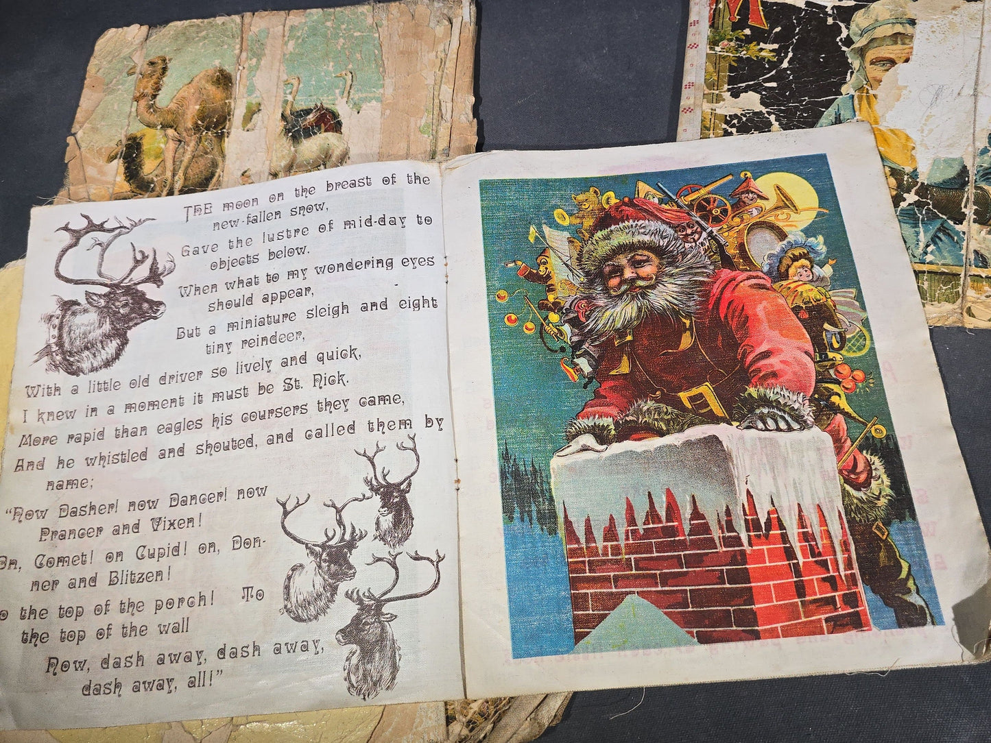 Grouping of Antique Craft Grade Illustrated Children's Books including "The Christmas Basket" by Mrs. Martha J. Lamb (1882), "Santa Claus & His Works" by McLoughlin Bros., "The Night Before Christmas," and Dean's Rag Book "Pets"